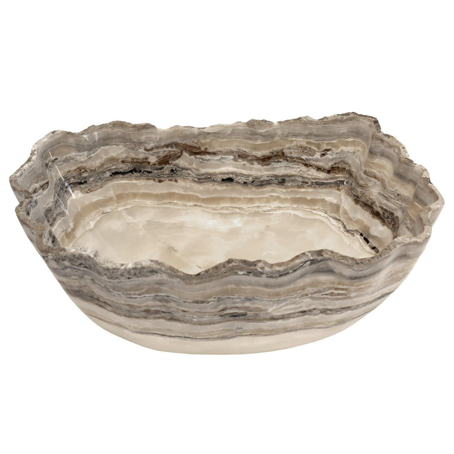Handmade in Mexico
Carved from a single piece of onyx
One of a kind
Dimensions: 17 x 13.5 x 7 D in. / 43 x 34 x 18 D cm

A spectacular, organic, undulating vessel of cream transparent stone contrasted with brown and tan layers. The deep bowl is