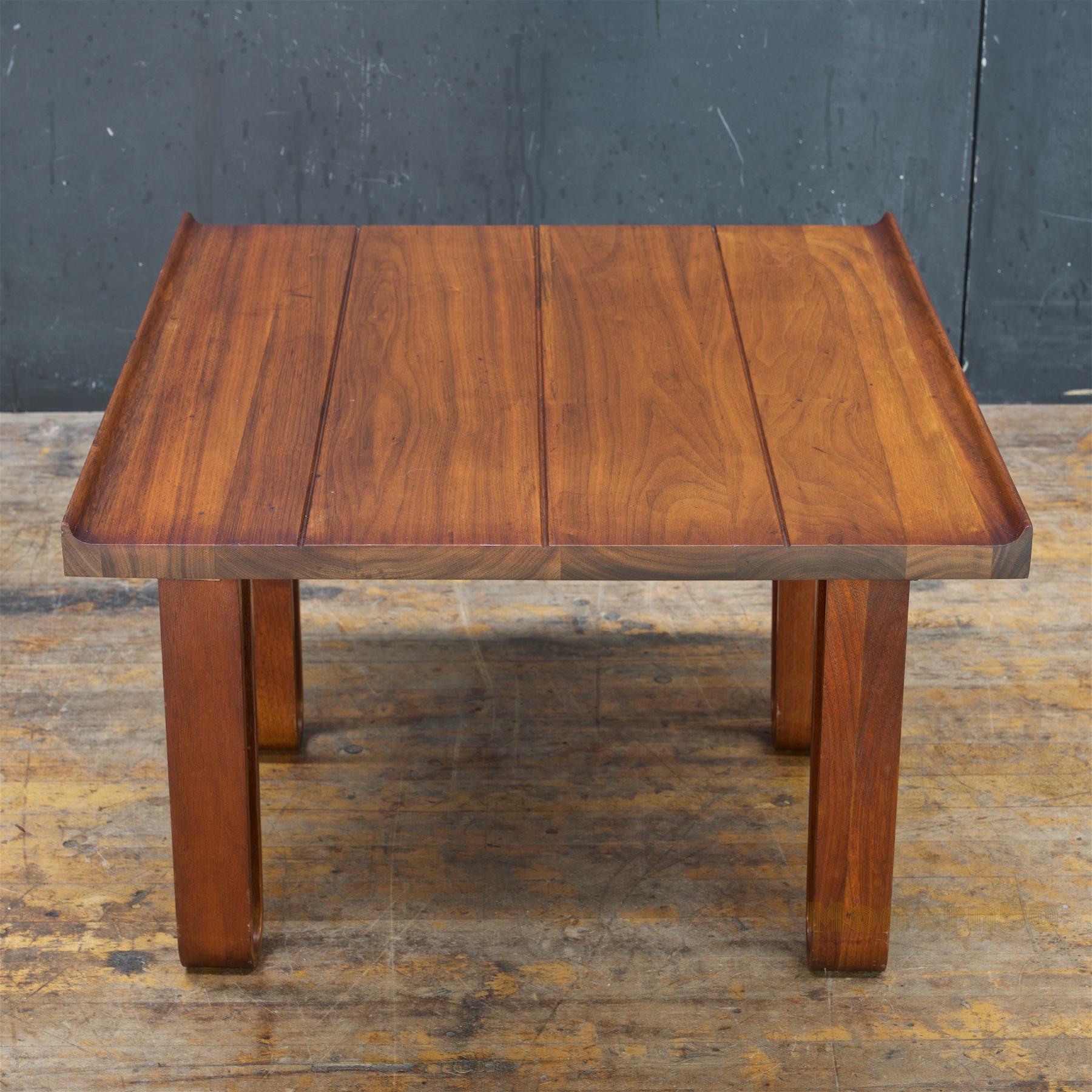 Warm staved solid walnut table surface, and very interesting proportions. No makers marks.