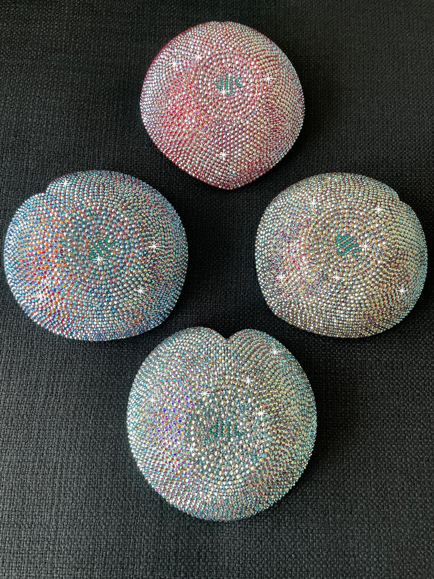 You will be deeply in love with this gorgeous heart shaped bowl.This bowl has been transformed by mixing 3 color crystals that have been treated with a Aurora Borealis finish. These colors are a wonderful symphony of pastel majesty.The stones are