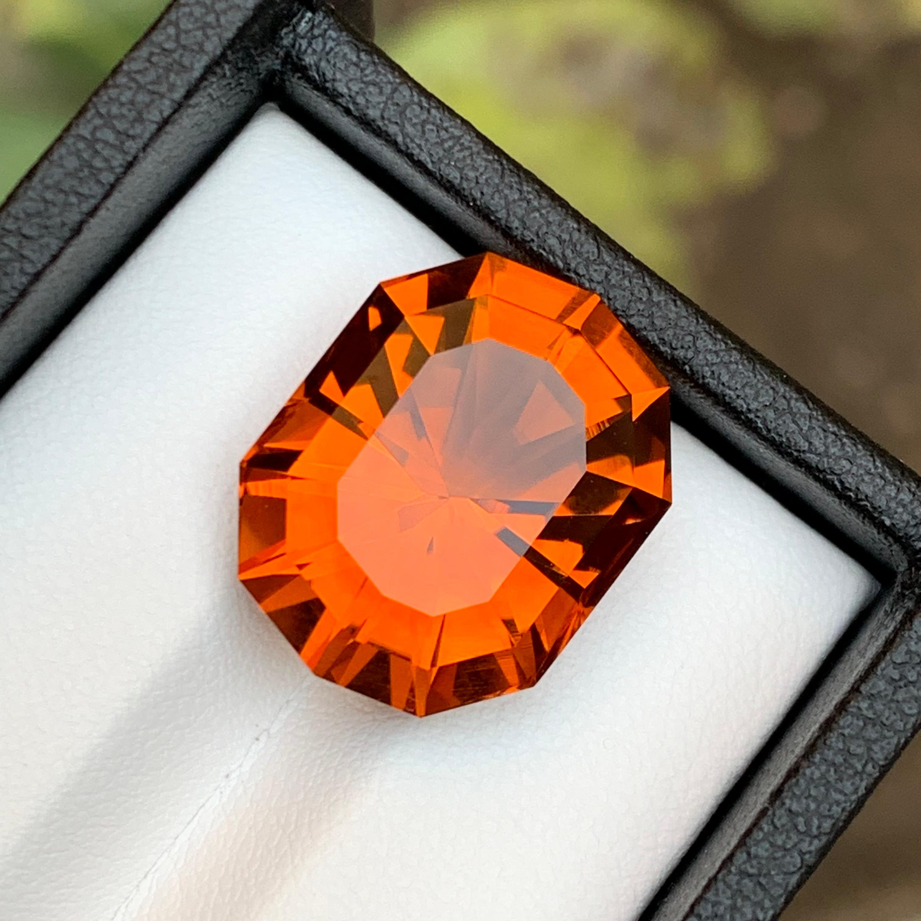 GEMSTONE TYPE: Madeira Citrine
PIECE(S): 1
WEIGHT: 15.30 Carats
SHAPE: Fancy
SIZE (MM):  19.00 x 14.74 x 10.72
COLOR: Deep Fanta Orange
CLARITY: Loupe Clean
TREATMENT: None
ORIGIN: Brazil
CERTIFICATE: On demand

Feast your eyes on a radiant gemstone