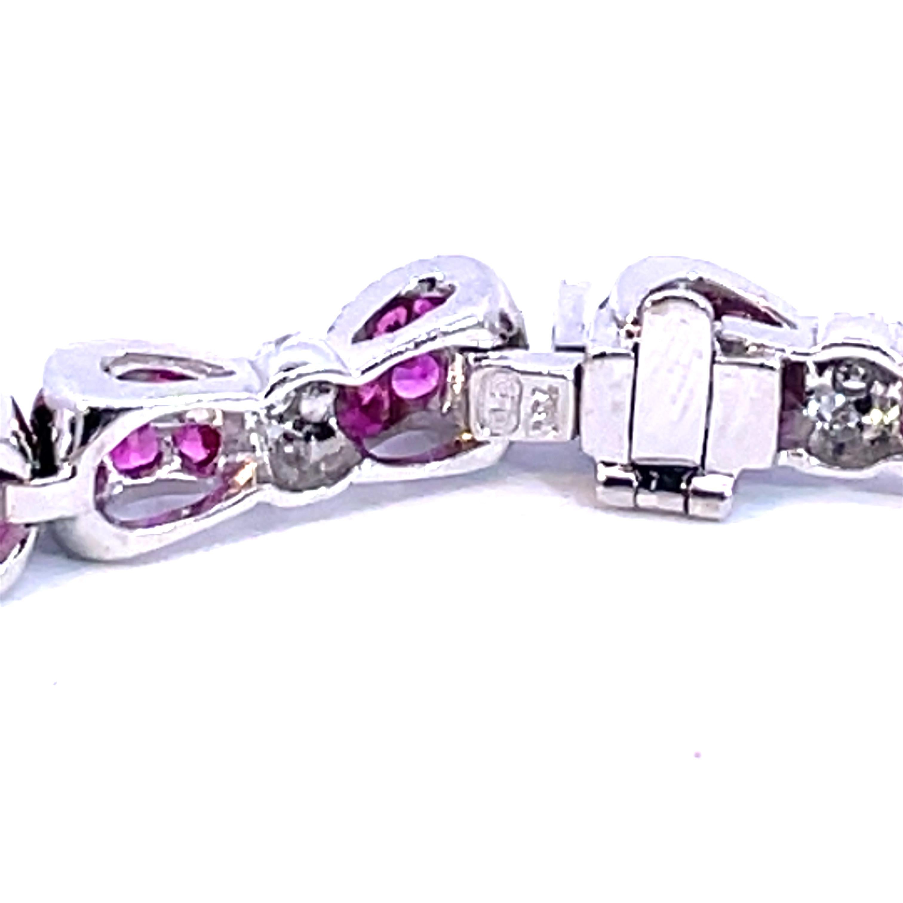 Round Cut Deep Pink Sapphire & White Diamond Bow Tie Bracelet in 18 Karat White Gold  For Sale