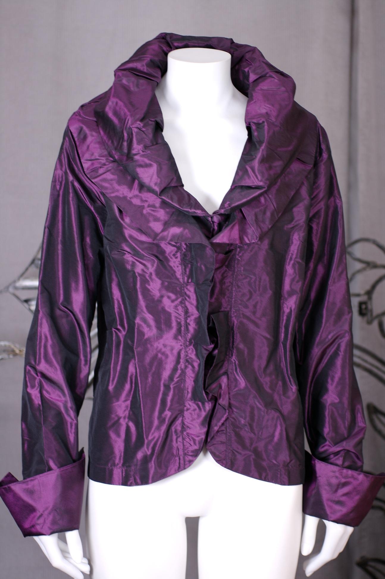 Deep Purple Taffeta Blouse from Camiceria San Marco, Venice. The Camiceria was an institution in Venice, providing custom dressmaking services for tourists and well heeled locals alike. 
Deep violet silk taffeta blouse with double ruffle which