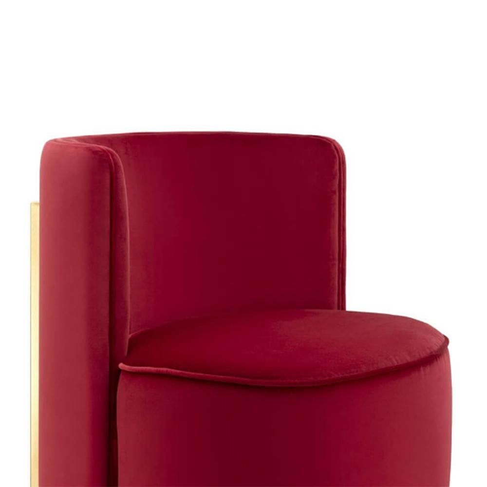 Chair deep red upholstered and covered 
With light pink velvet fabric. With 4 metal feet 
In gold finish.