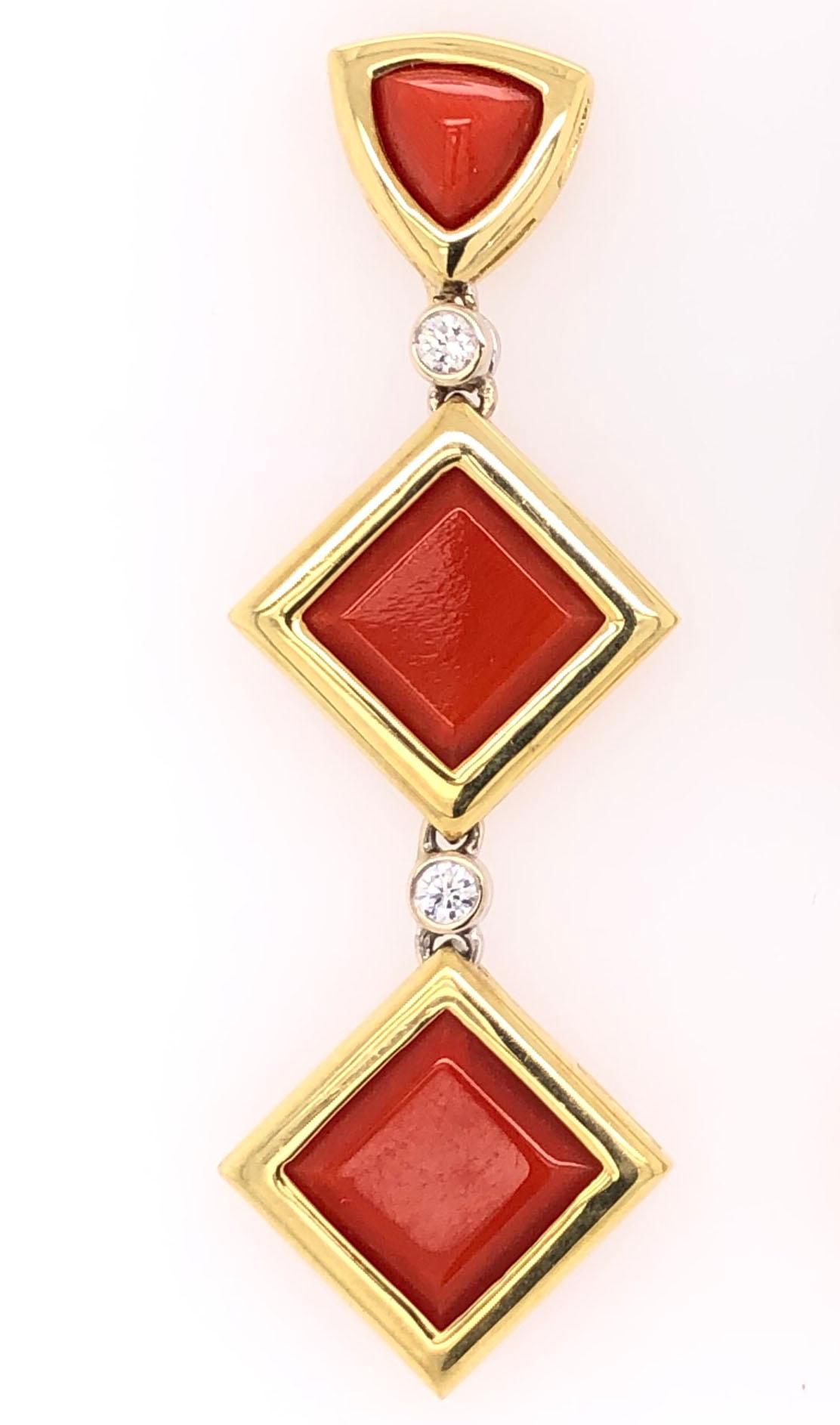 Simply Beautiful! Stylish and finely detailed Deep Red Coral and Diamond Drop Vintage Gold Earrings. Hand crafted in 18 Karat Yellow Gold and hand set with square Coral gemstones, approx. 45.00 total Carat weight and Diamonds, weighing approx. 0.24