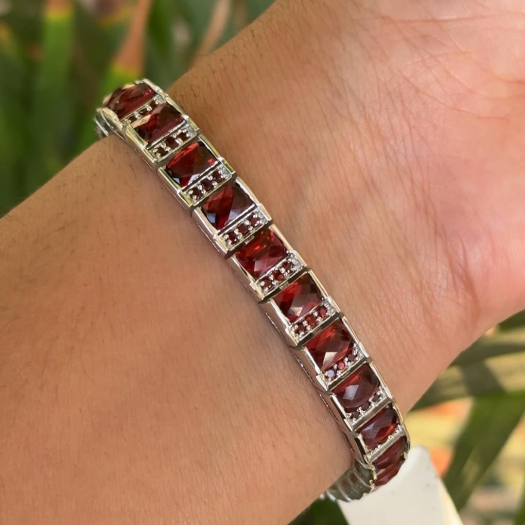Deep Red Garnet Stone Tennis Bracelet in sterling silver showcases endlessly sparkling natural garnrt, weighing 19.45 carat. It measures 7 inches long in length.
Natural Garnet stimulate concentration and reduces stress.
Designed with perfect
