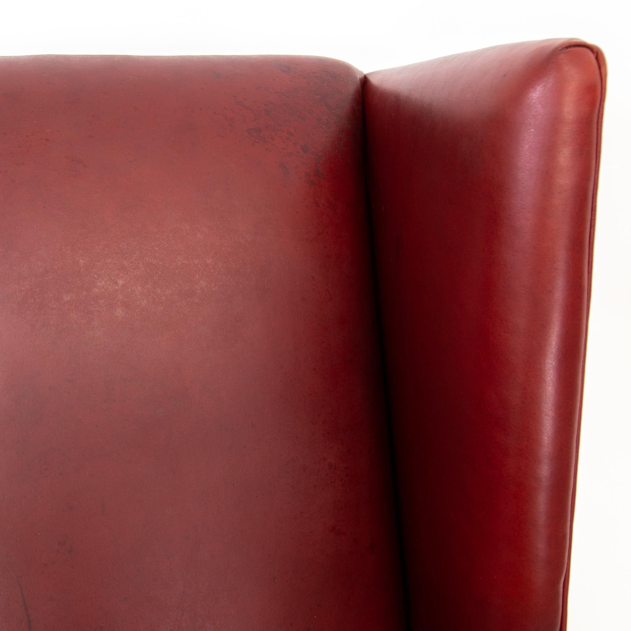 Deep Red Leather Wingback Fireside Chair with Brass Nailhead Trim by Massoud 1