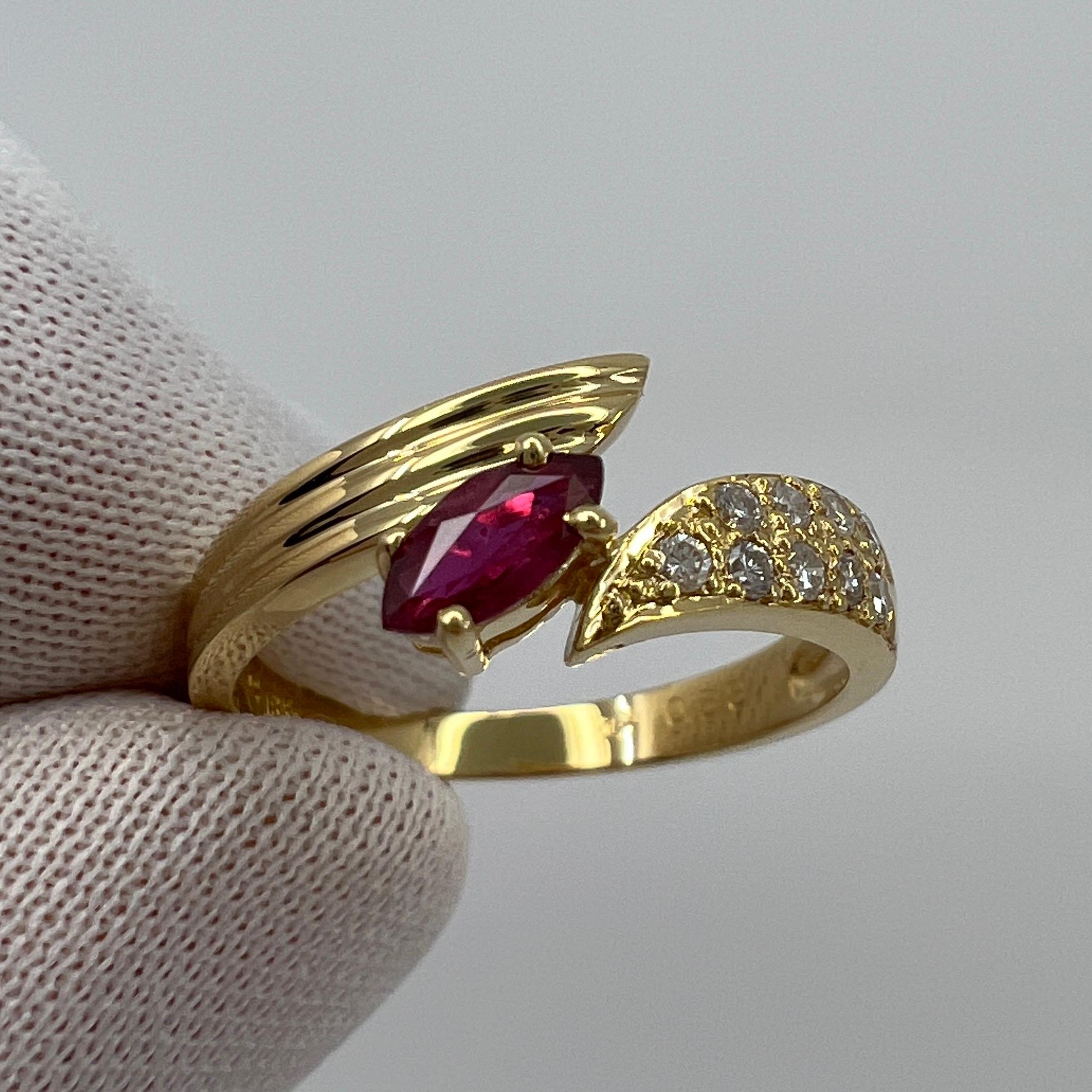Deep Red Marquise Cut Ruby & Pave Diamond 18k Yellow Gold Fancy Ring.

Unique designed ring featuring a 0.38 carat ruby with a deep red colour. Has an excellent marquise/navette cut and very good clarity, with only some small natural inclusions
