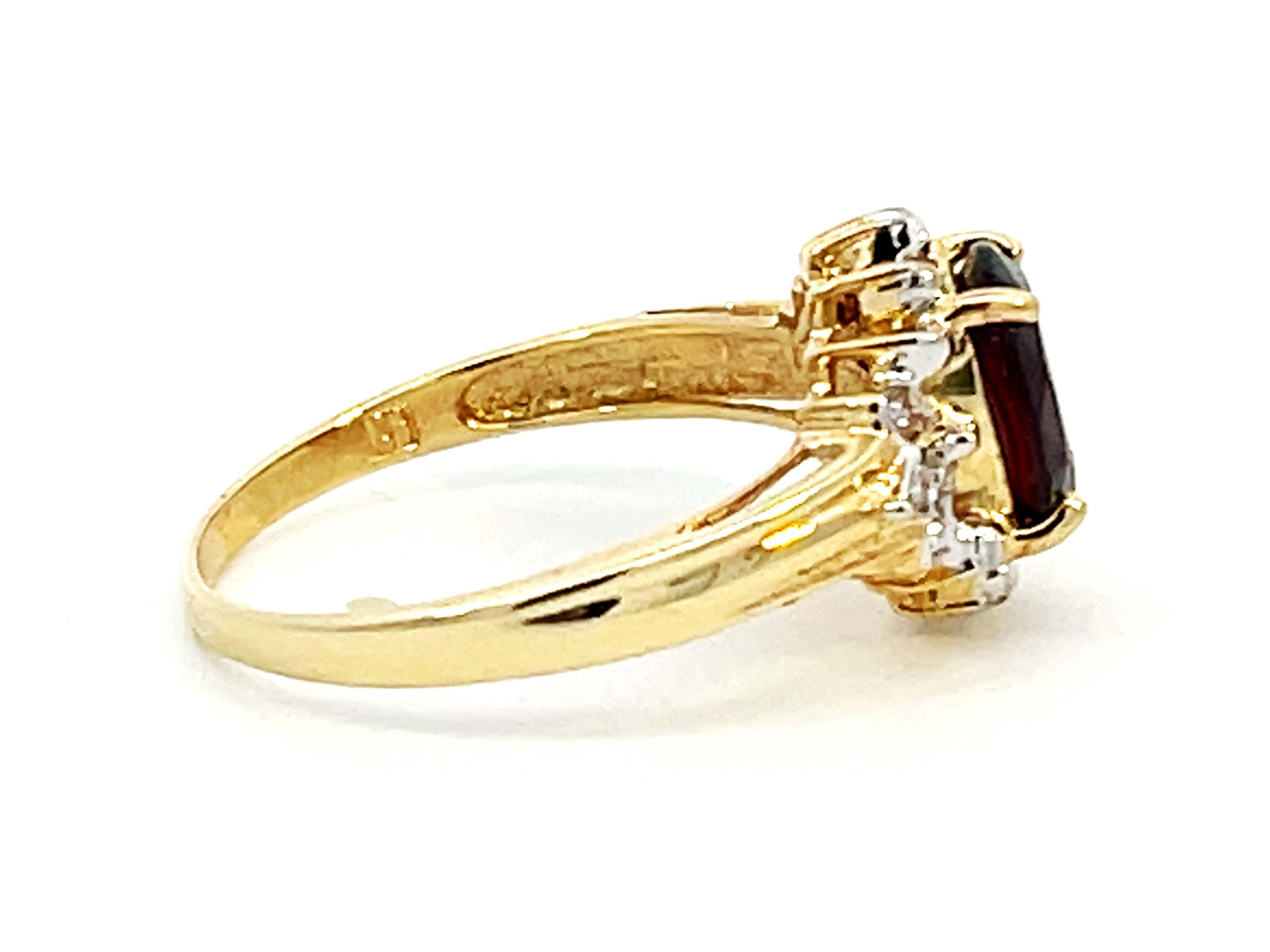 Deep Red Oval Garnet and Diamond Ring 14k Yellow Gold In Excellent Condition For Sale In Honolulu, HI