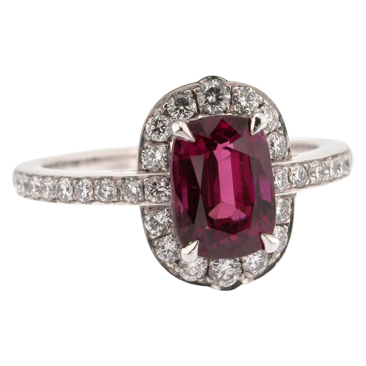 2.70 Carats Deep Red Ruby and White Diamond Halo Ring For Sale