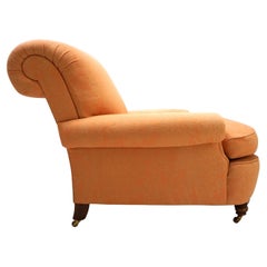 Deep seated armchair in the style of Howard & Sons