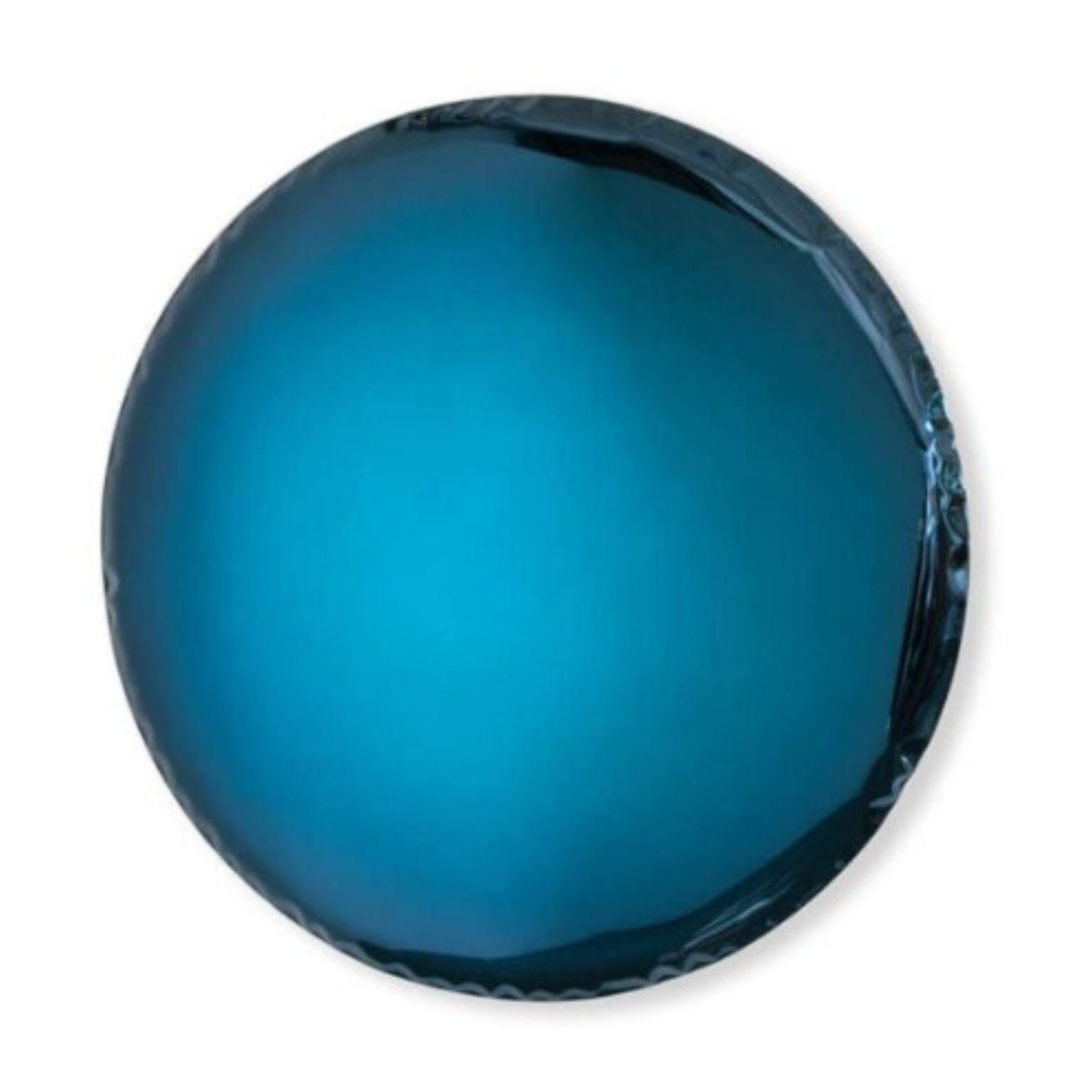 Deep Space Blue Oko 36 sculptural wall mirror by Zieta
Dimensions: Diameter 36 x D 6 cm 
Material: Stainless steel. 
Finish: Deep Space Blue.
Available in finishes: Stainless Steel, Deep Space Blue, Emerald, Sapphire, Sapphire/Emerald, Dark Matter,