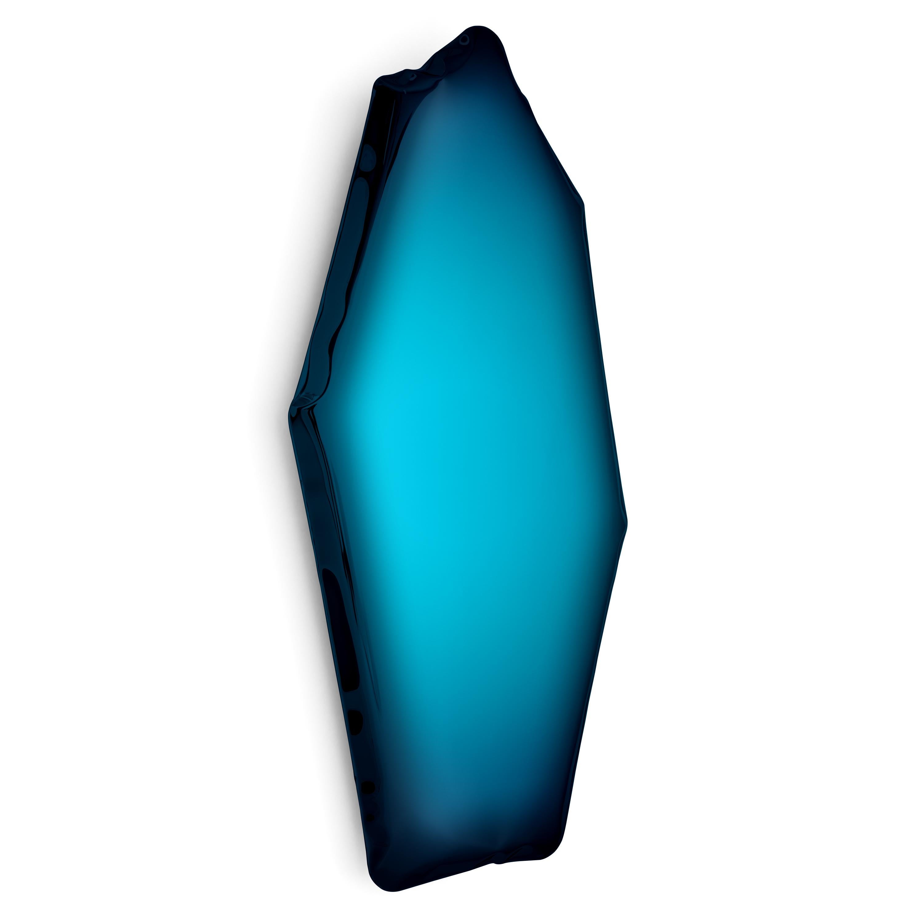 Deep Space Blue C4 Sculptural Wall Mirror by Zieta
Dimensions: D 6 x W 50 x H 100 cm 
Material: Stainless steel. 
Finish: Deep Space Blue.
Available in finishes: Stainless Steel, Deep Space Blue, Emerald, Saphire, Saphire/Emerald, Dark Matter, and