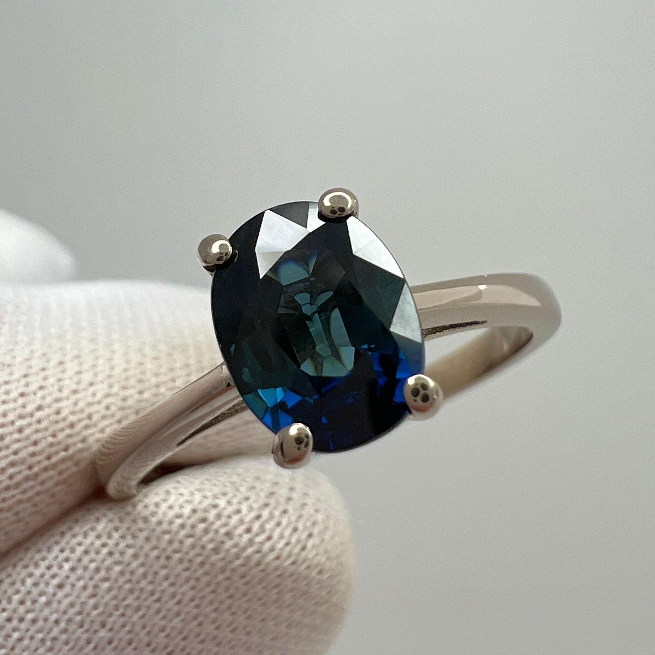 Deep Teal Blue 1.60 Carat Sapphire Oval Cut 18 Karat White Gold Solitaire Ring In New Condition For Sale In Birmingham, GB