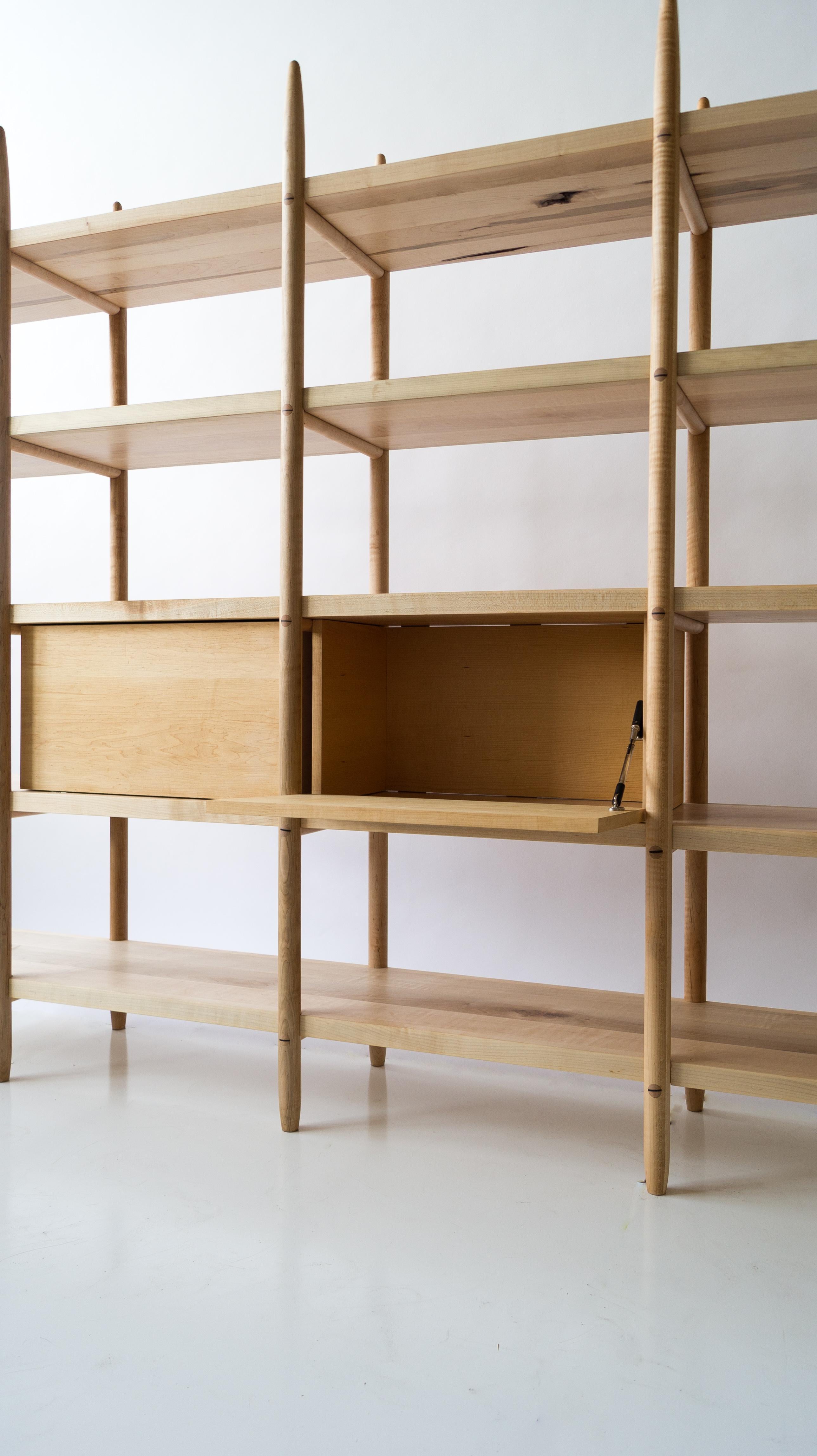 The Deepstep shelving includes exquisite wood detailing and a clean, clear profile. Designed entirely without fasteners or screws, the design instead utilizes traditional and innovative wood joinery solutions. 

Designed and handmade with the