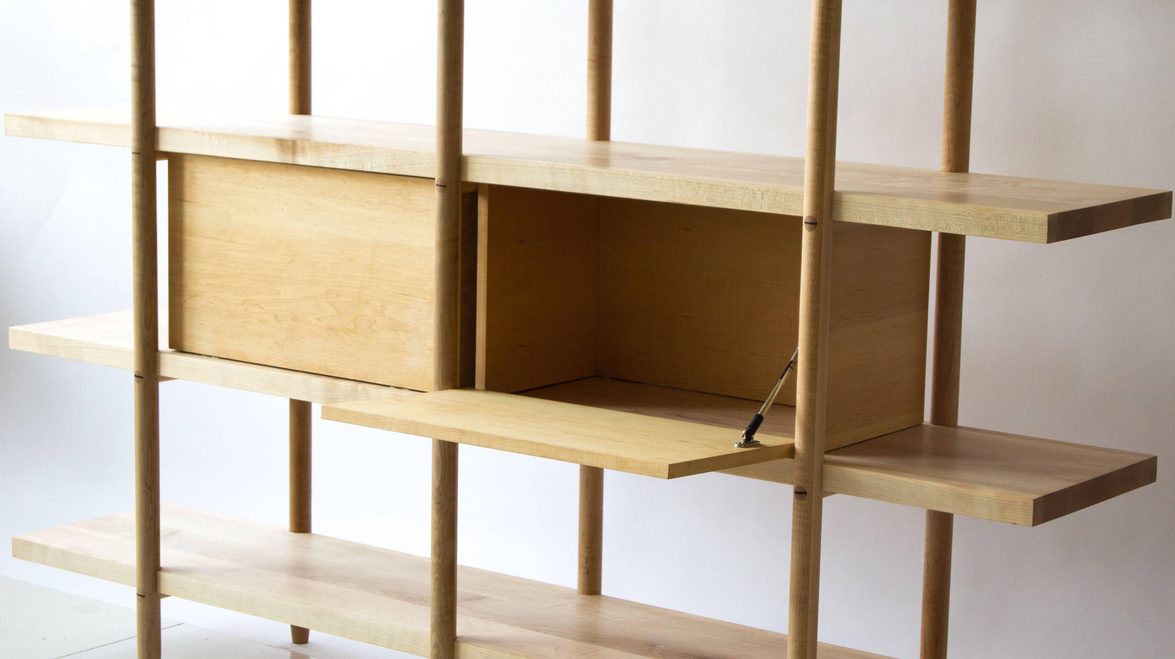 The Deepstep Shelving includes exquisite wood detailing and a clean, clear profile. Designed entirely without fasteners or screws, the design instead utilizes traditional and innovative wood joinery solutions. 

Designed and handmade with the