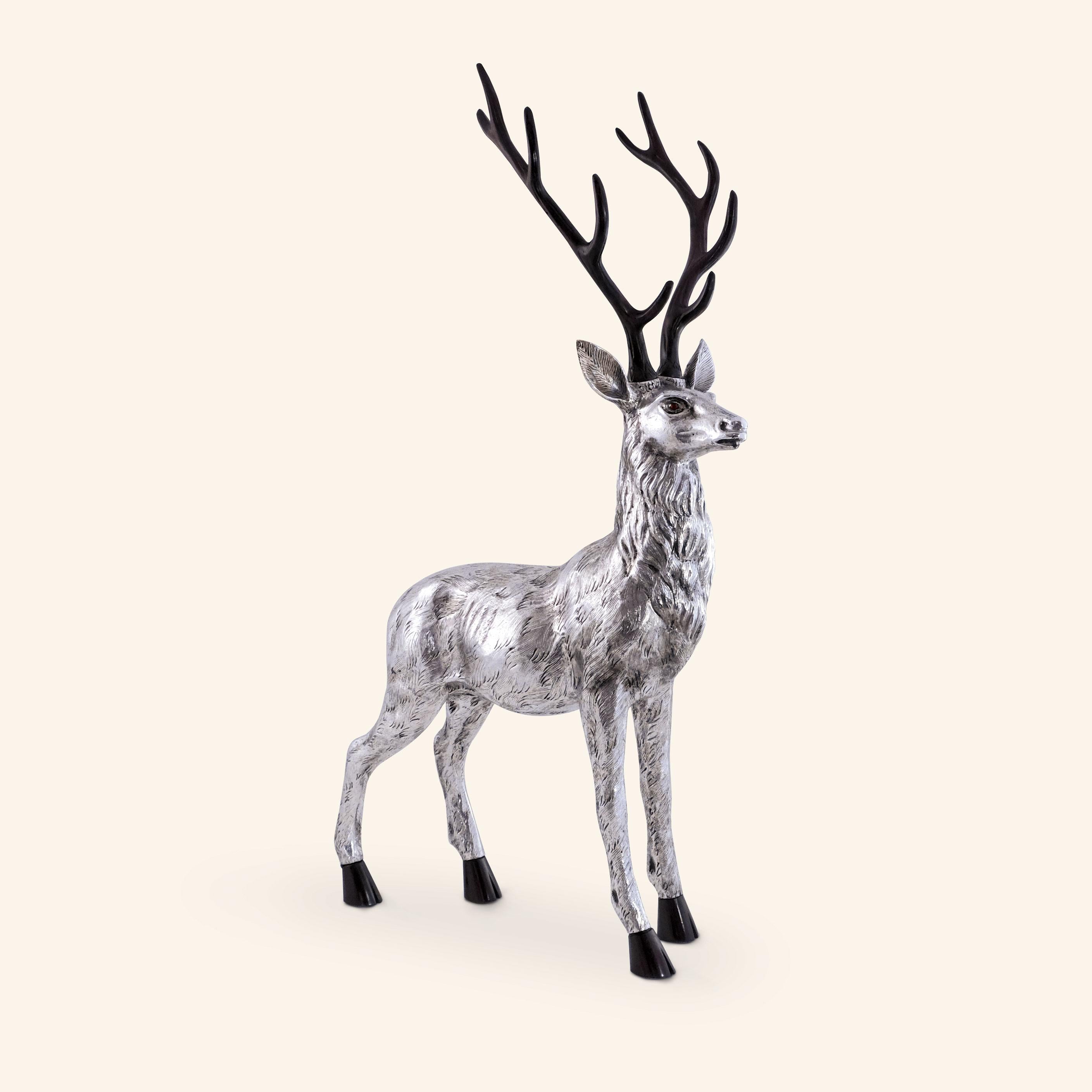 Deer by Alcino Silversmith 1902 is a handcrafted piece in 925 sterling silver with Jacaranda wood application in the antlers and feets.
The piece is totally handcrafted, hammered and chiseled by excellent craftsmen, giving this piece a much higher