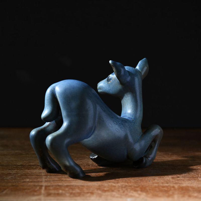 Deer figurine in ceramic by Gunnar Nylund

Stoneware figurine from Rörstrand.

Additional information:
Material: Ceramic
Artist: Gunnar Nylund
Size: 13 W x 5.5 D x 17 H cm.