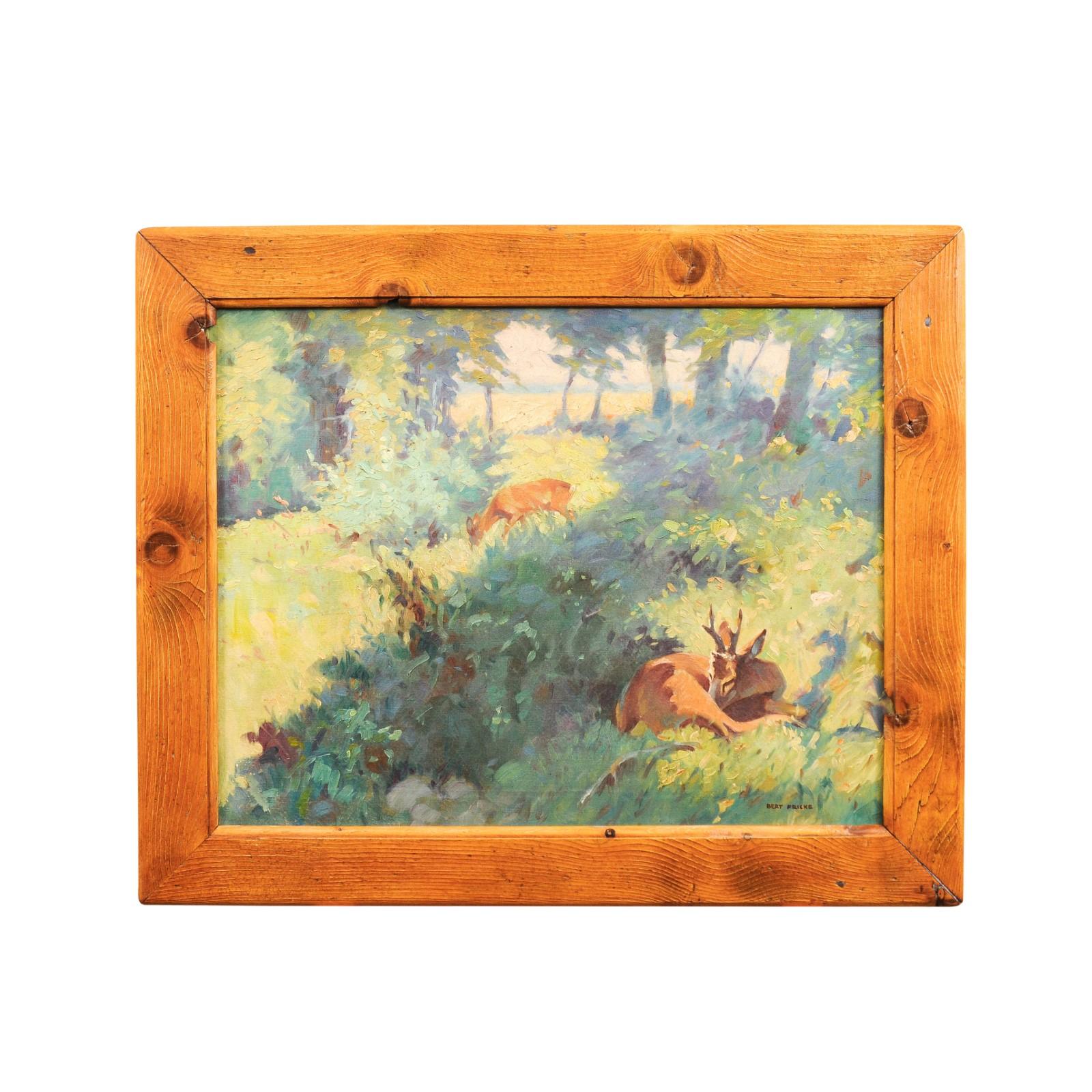 A German oil on panel painting by Bert Fricke Wolfenbuttel titled 'Deer in the Woods' from the early 20th century, in natural wooden frame. Created in Germany during the first quarter of the 20th century, this horizontal oil on panel painting