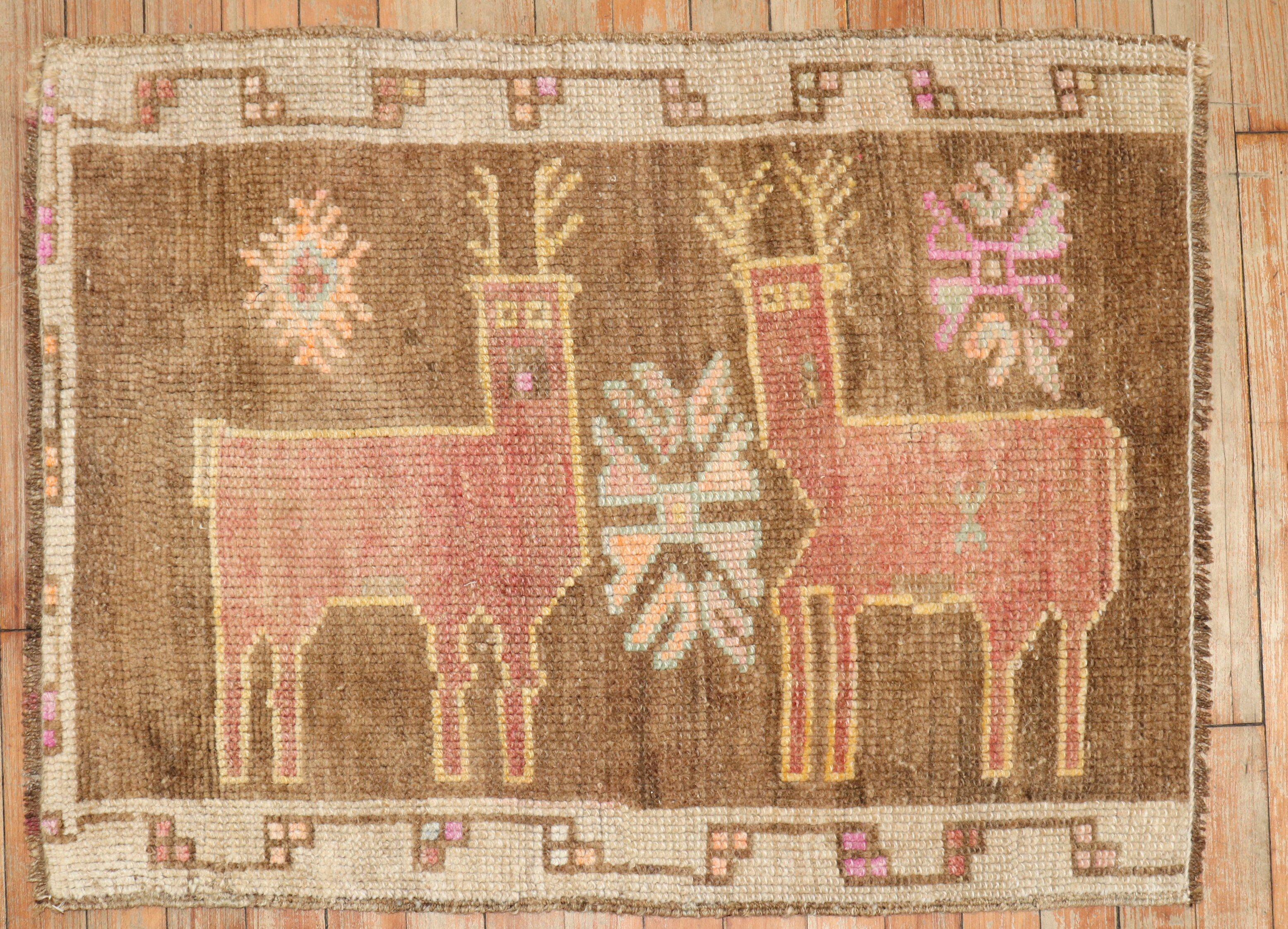 Mid-20th Century turkish rug depicting 2 deers on a brown field

Measures: 2'1