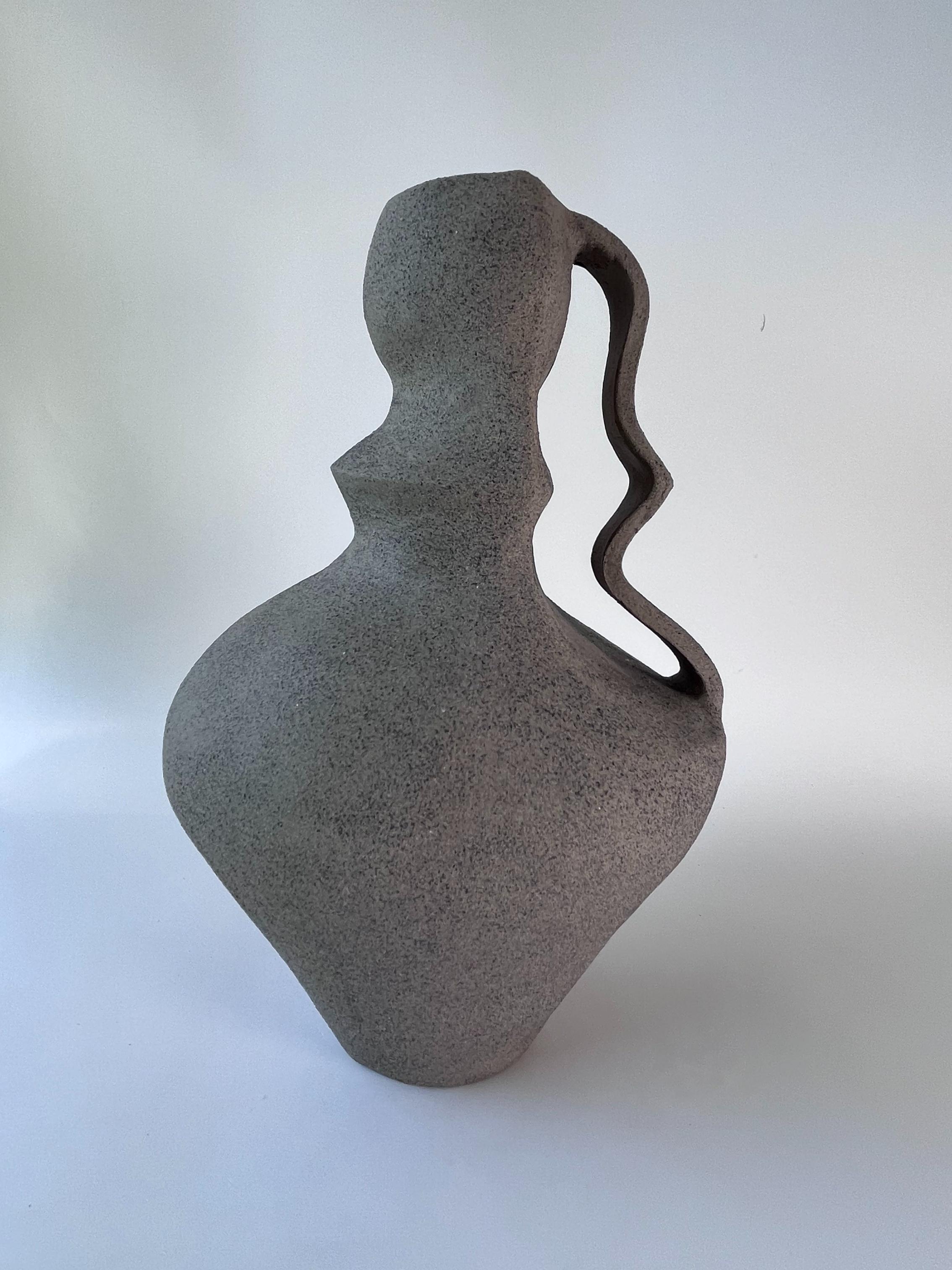 Deficiency 11 Vase by Rezzo Ceramics
Dimensions: W 17 x D 17 x H 26 cm (Dimensions may vary)
Materials: Stoneware
Finish: Unglazed. Suitable for dry flowers

Esra Misirli Kubilay is a Turkish ceramic artist. She took the design in to the focus of
