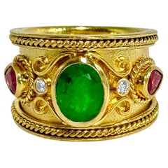 Anello a sigaro in oro 18 carati con rubino smeraldo e diamanti Etruscan Revival
