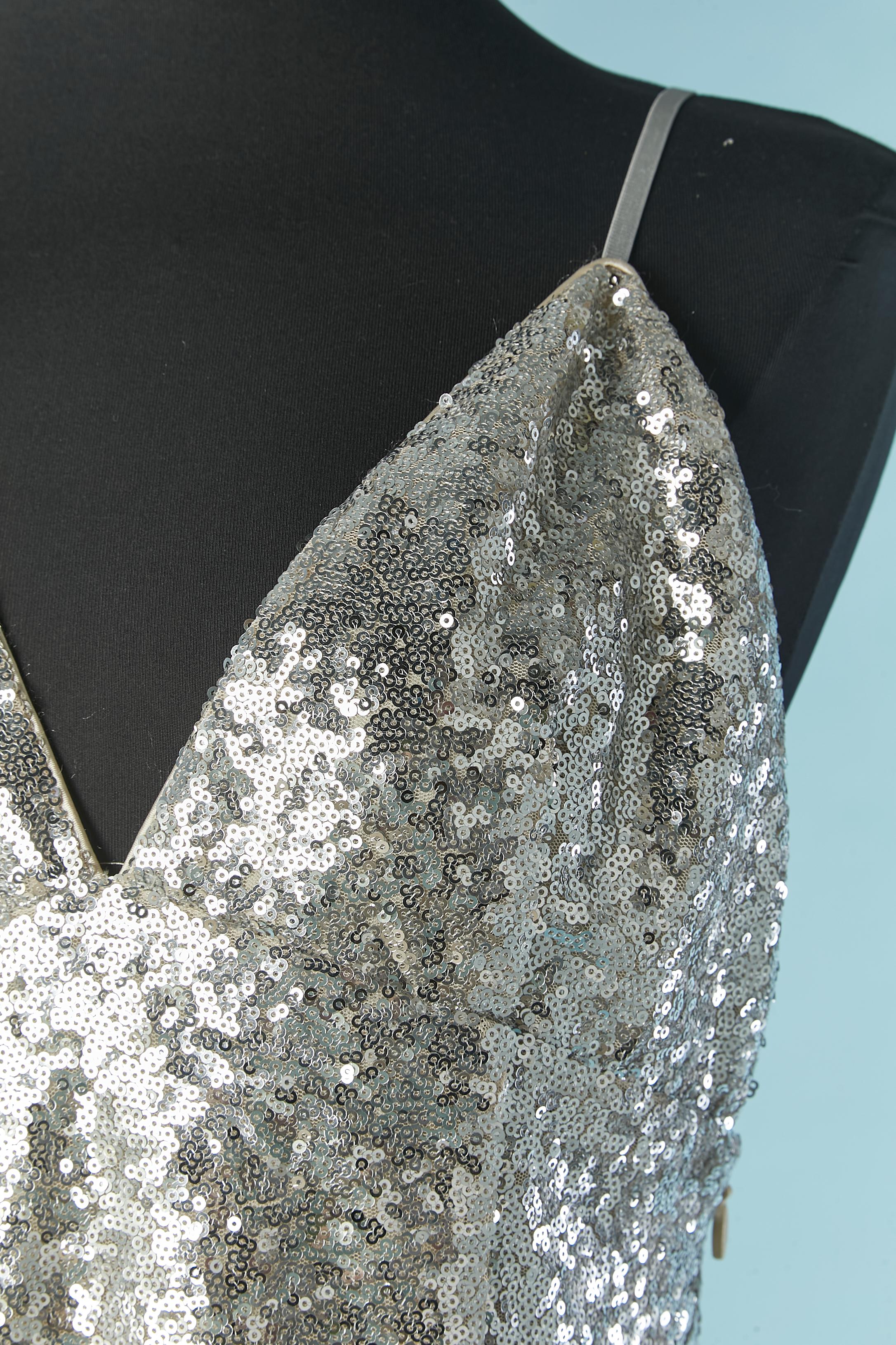 Degradé ( from silver to pink) sequin cocktail dress. Main fabric composition and lining : 100% polyester.
Adjustable shoulder strap. Zip closure on the left side. 
NEW with tag
SIZE M 