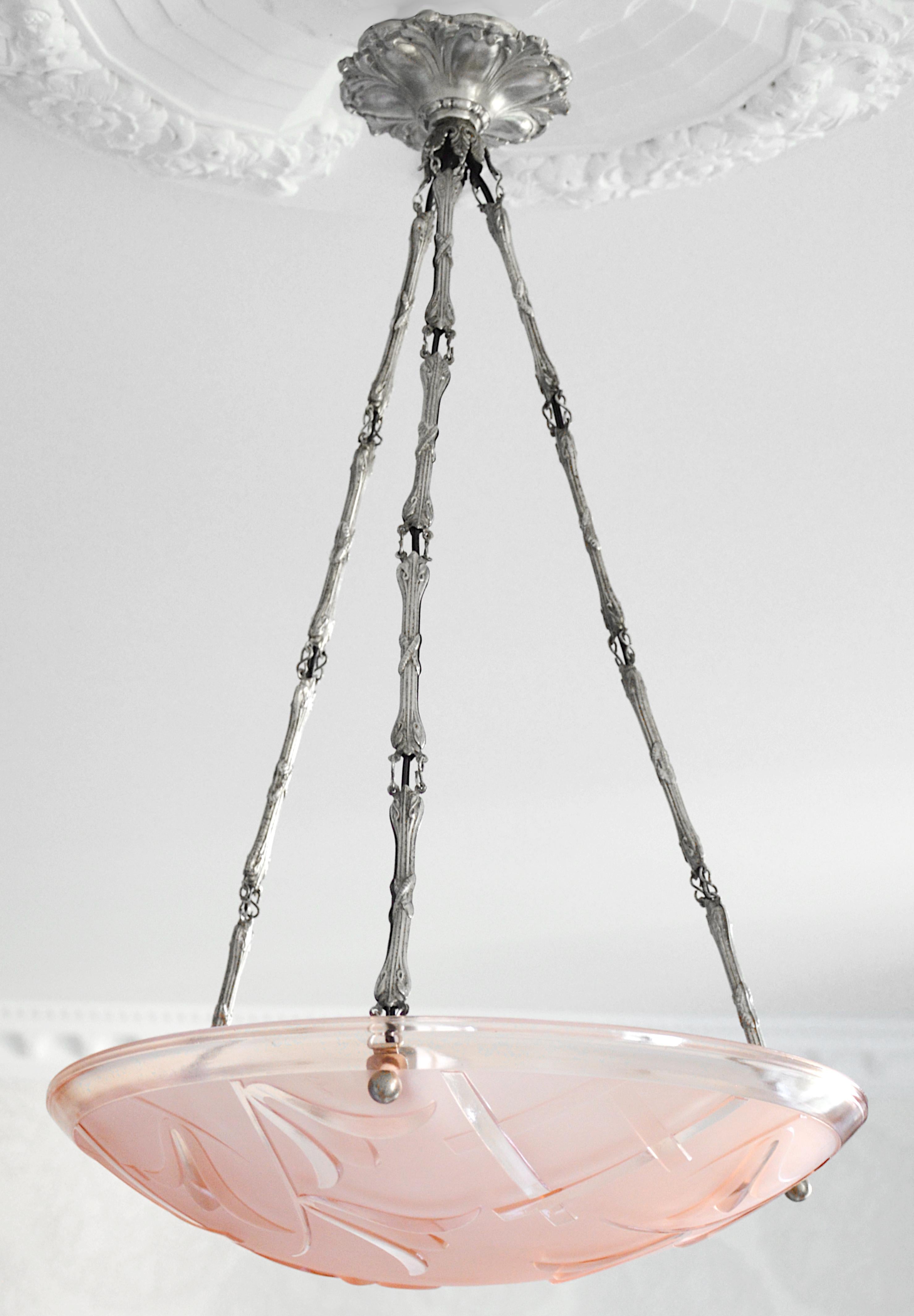 French Art Deco pendant chandelier by Degue (Compiegne), France, 1920s. Pink frosted glass shads with an Art Deco stylized floral pattern. Stamped brass frame. Height: 24.8