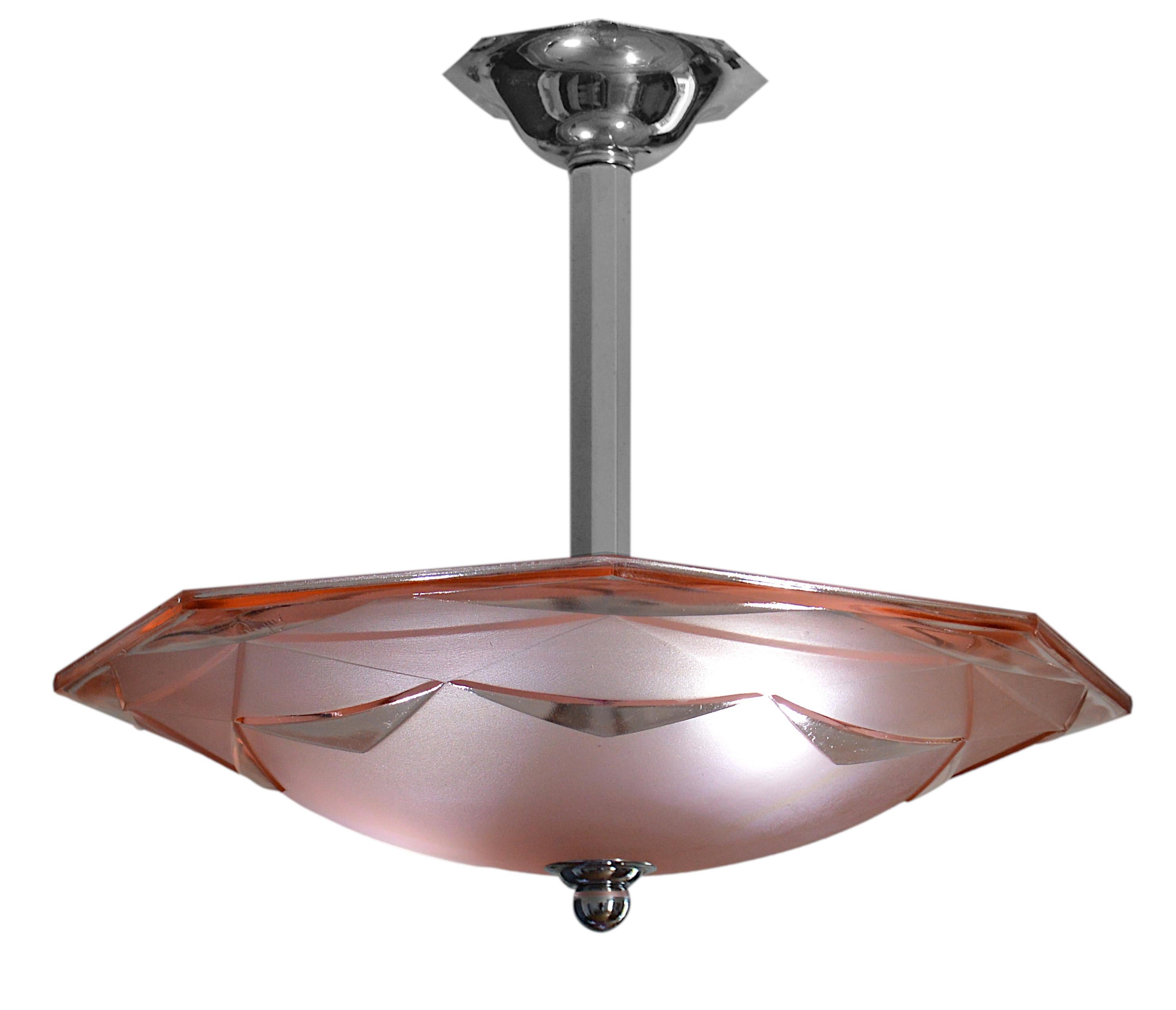 French Art Deco pendant chandelier by Degue (Compiegne), France, Early 1930s. Pink frosted glass shade with an Art Deco geometric pattern. Chrome frame. Height: 24.8