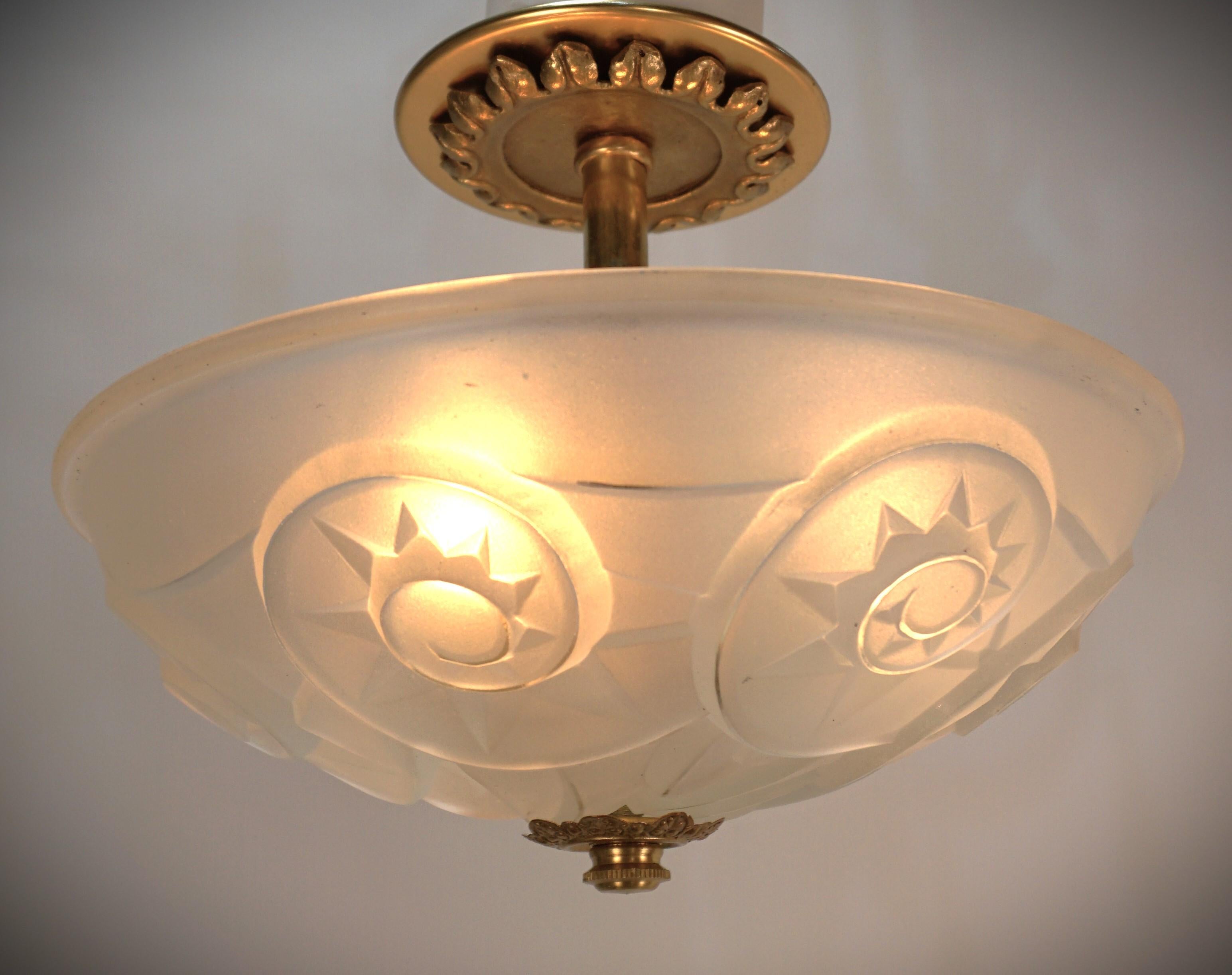 clear frost glass semi flush mount chandelier with bronze hardware by Degue.
Professionally rewired and ready for installation.
Three lights, 100 watts max each. 