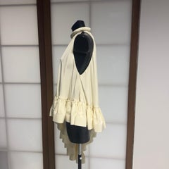 Del Core Top asimétrico de seda con cuello alto y volante en cascada - Made in Italy