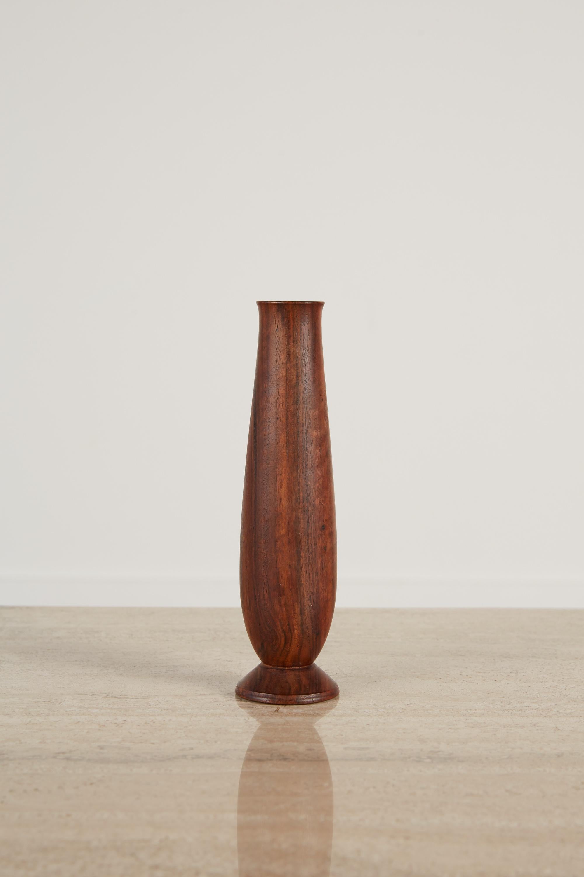 With a similar turned bud vase in the Smithsonian American Art Museum, Del Stubbs and his craftsmanship is evident and well regarded by woodworkers and art collectors alike. His work exhibits a level of appreciation and understanding of how delicate