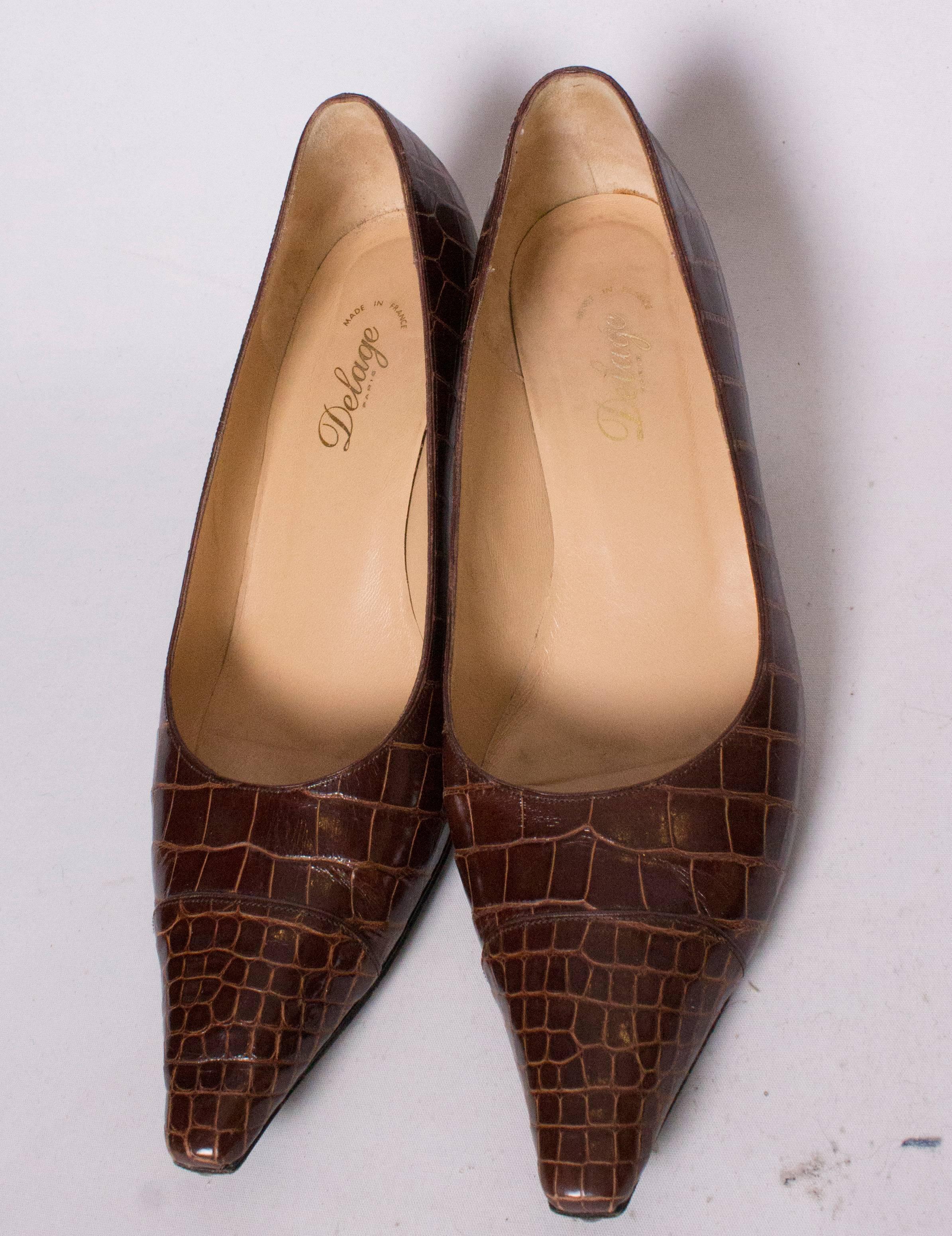 A chic pair of handmade shoes by Delage of Paris. In immaculate condition.