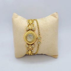 Montre DeLaneau en or jaune 18 carats et diamants avec arcs en diamants