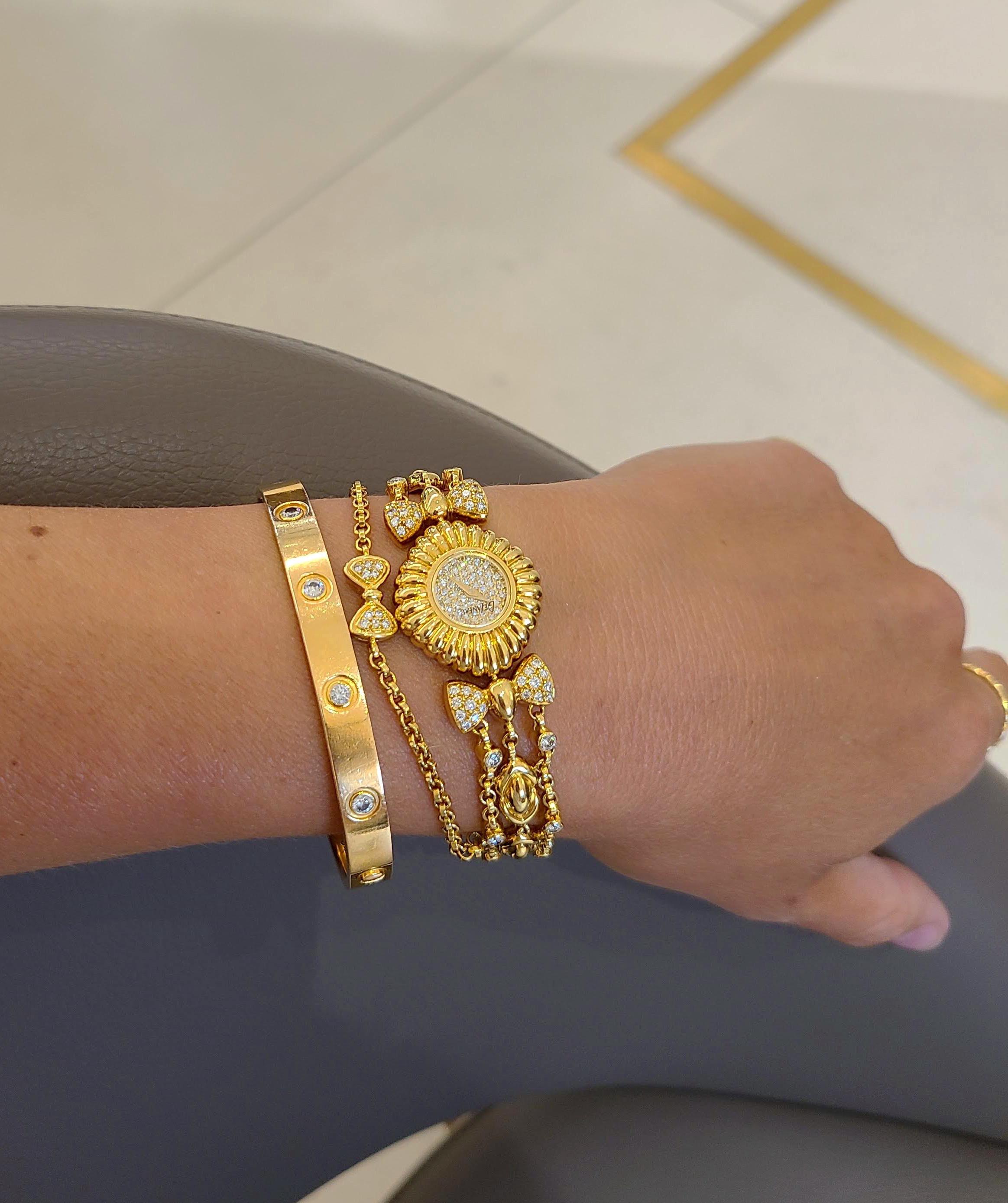 Contemporary DeLaneau 18 Karat Yellow Gold and Diamond Watch with Diamond Bows