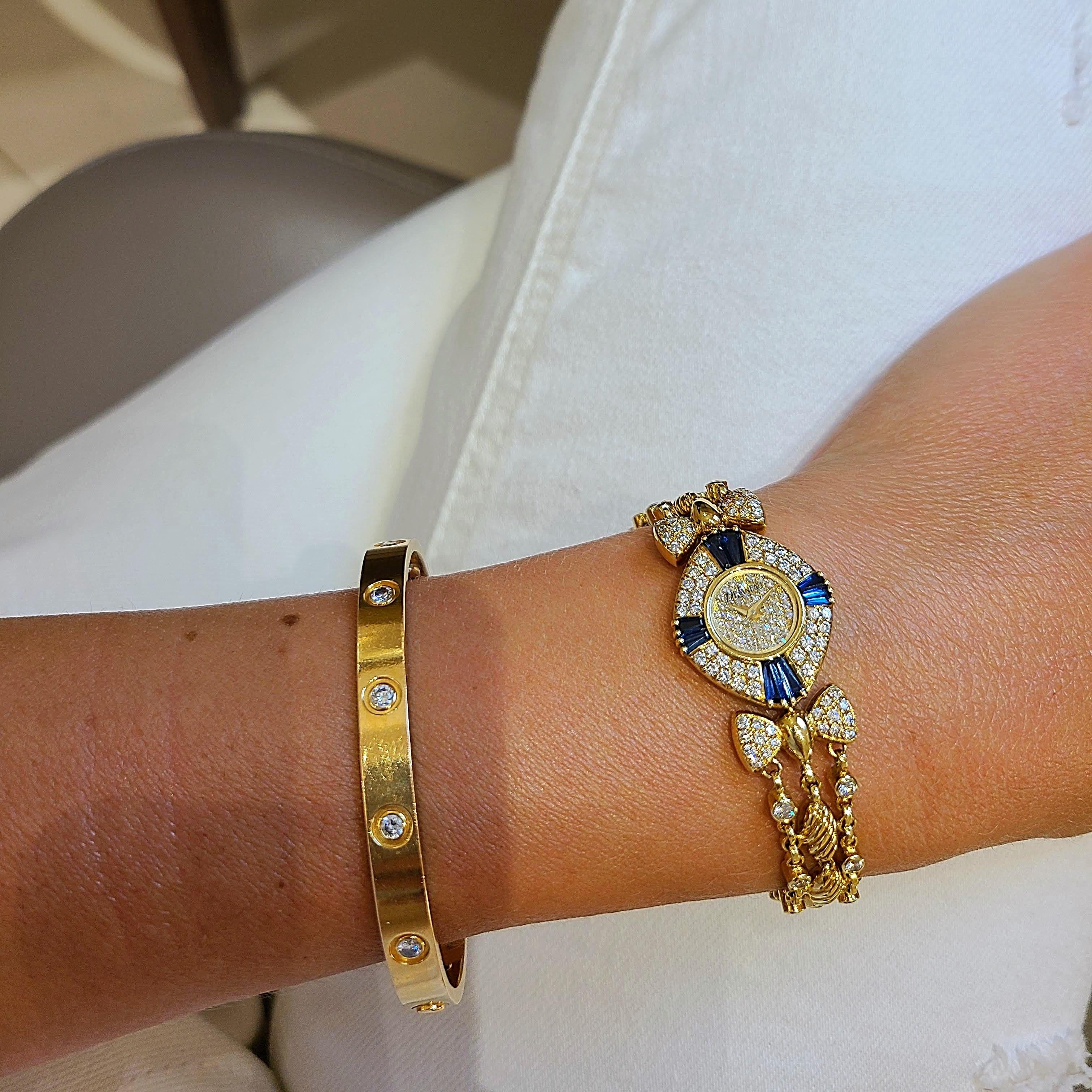 Contemporary DeLaneau 18 Karat Yellow Gold Diamond and Blue Sapphire Bracelet Watch For Sale