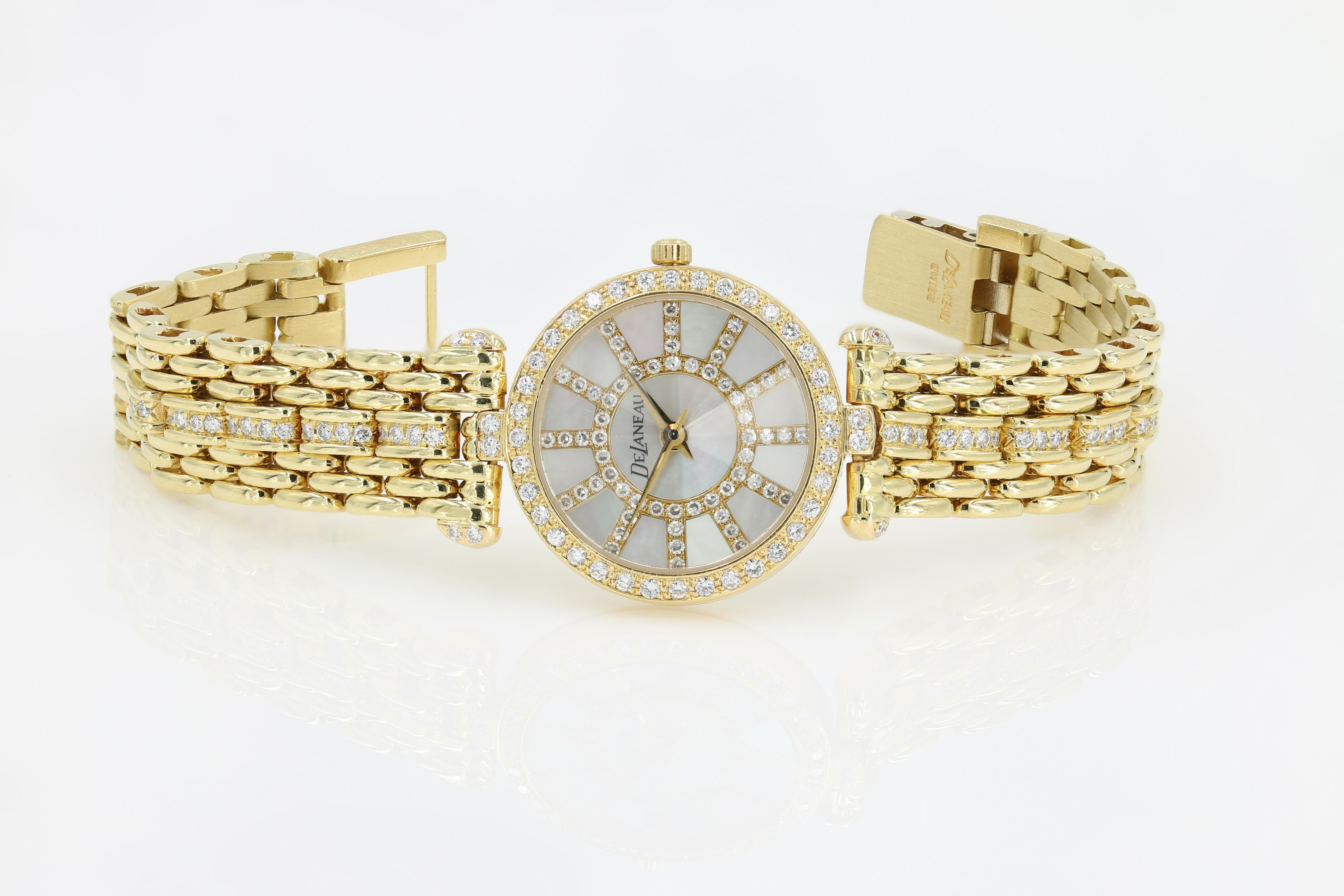 DeLaneau 18kt Yellow Gold & Diamond Bracelet Watch w/Faceted Crystal & MOP Dial - (Pre-owned - recently serviced and in excellent condition) - Lady’s DeLaneau l8kt. yellow gold Swiss quartz watch.  Mother of Pearl dial with diamond. Diamond bezel