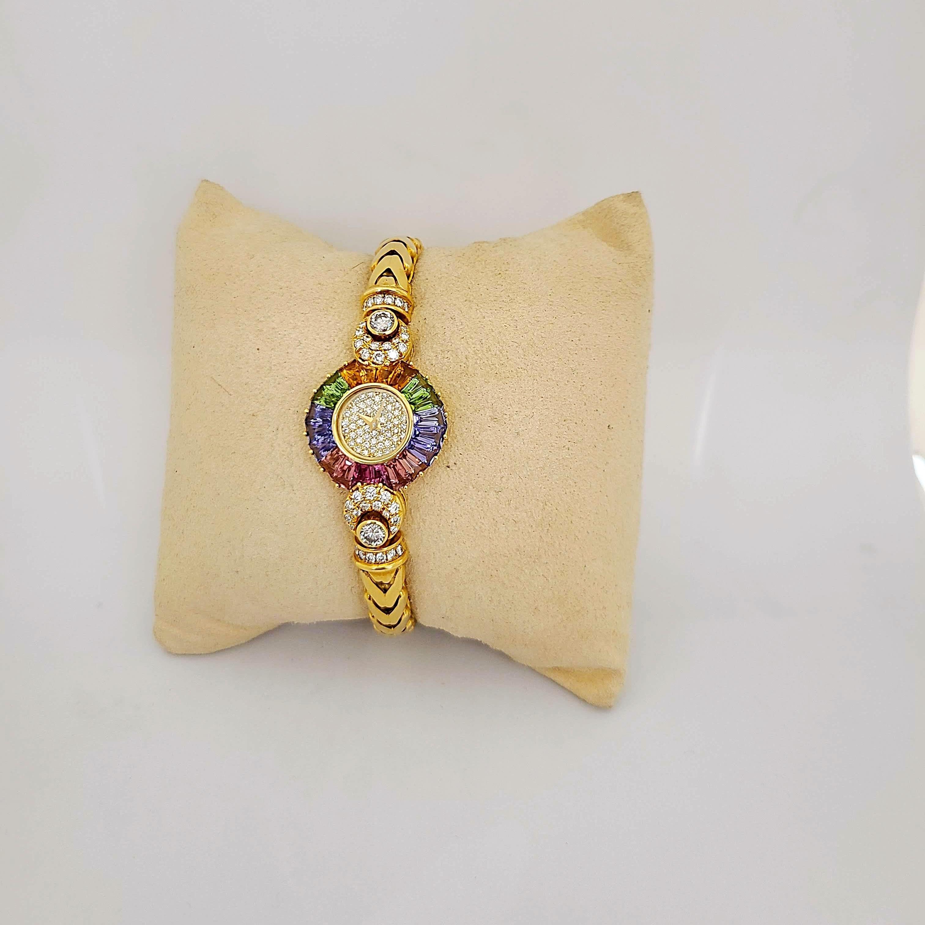 Taille baguette Montre-bracelet DeLaneau en or jaune 18 carats, diamants et saphirs multicolores en vente