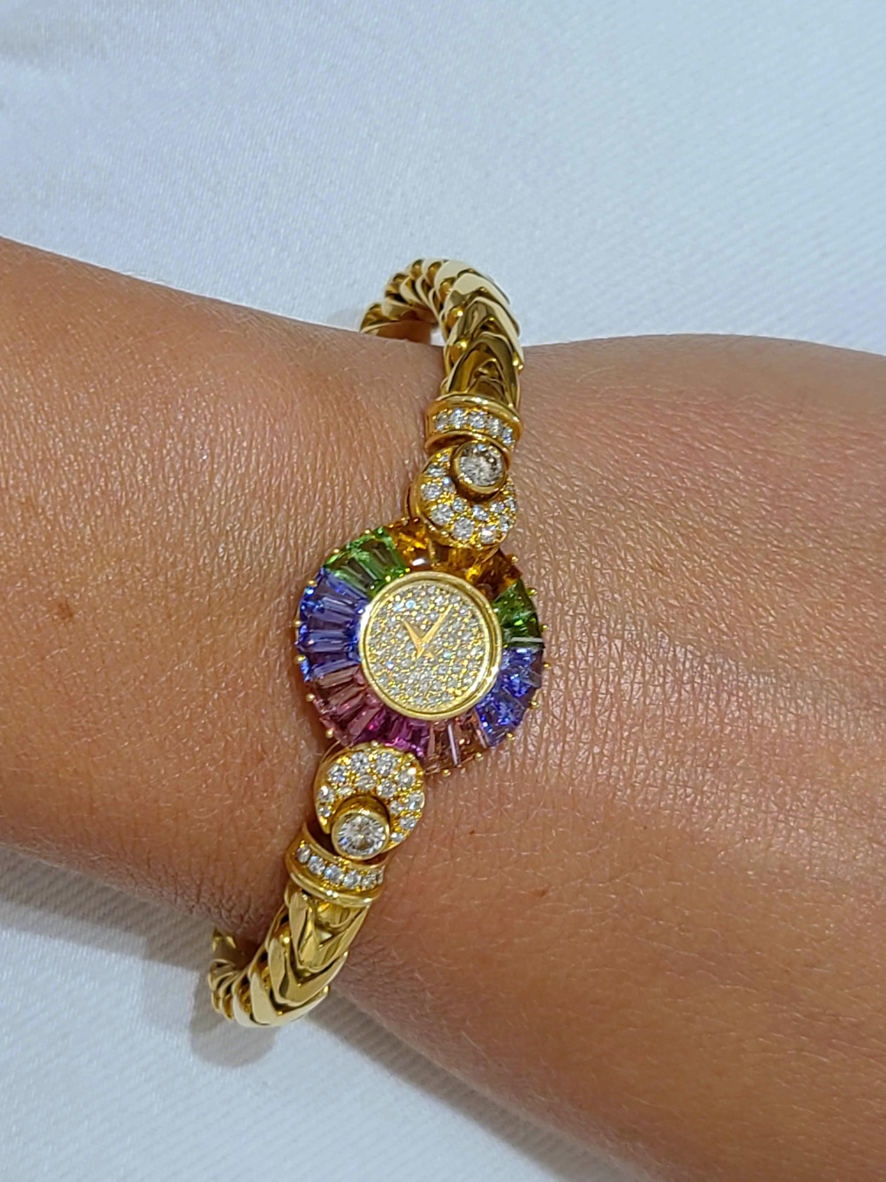 Baguette Cut DeLaneau 18 Karat Yellow Gold Diamond and Multicolored Sapphires Bracelet Watch For Sale