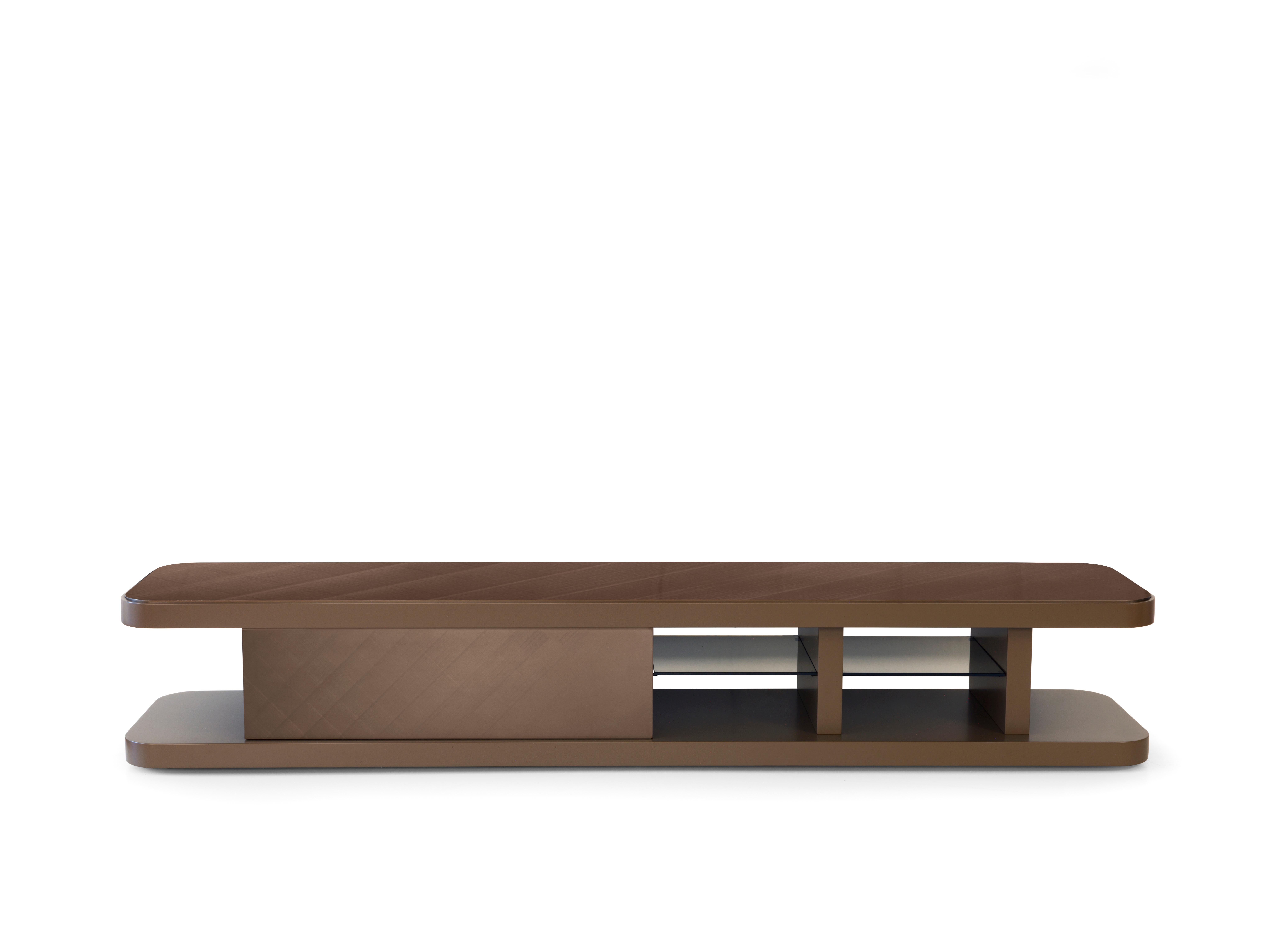 Delano 5046 TV Unit by Redeco
Dimensions: W 250 x D 50 x H 42 cm
Materials: Lightened mdf and mdf structure. One sliding doors. Four bronze glass shelves. 

ReDéco is a truly solid company, capable of building and creating furnishings, but also a