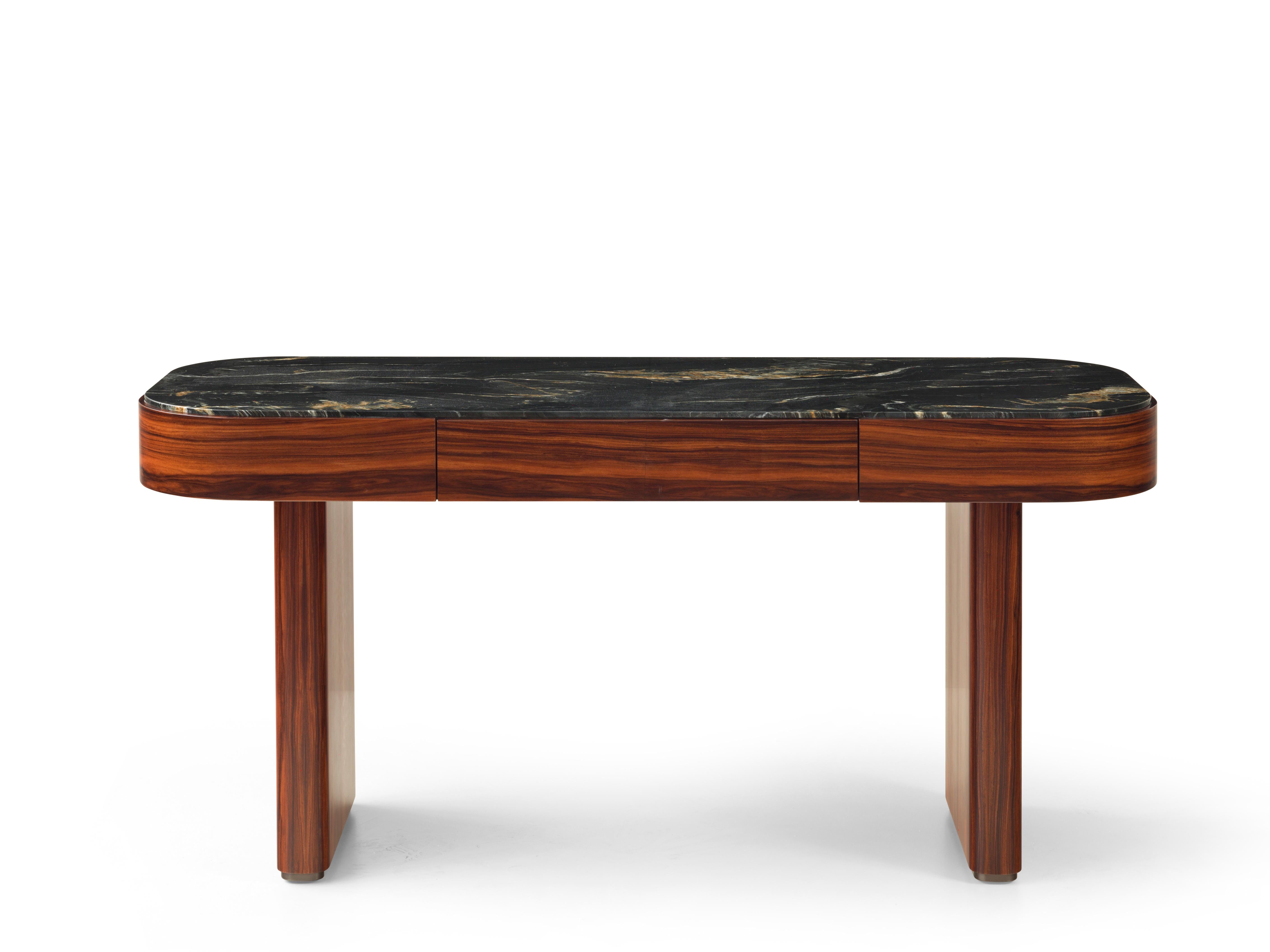 Delano 5063 Desk by Redeco
Dimensions: W 160 x D 60 x H 77 cm
Materials: Mdf structure. One soft closing drawer, Structure in Palissandro Santos veneer with polyester matt finish. Internal top in Belvedere marble.

ReDéco is a truly solid company,