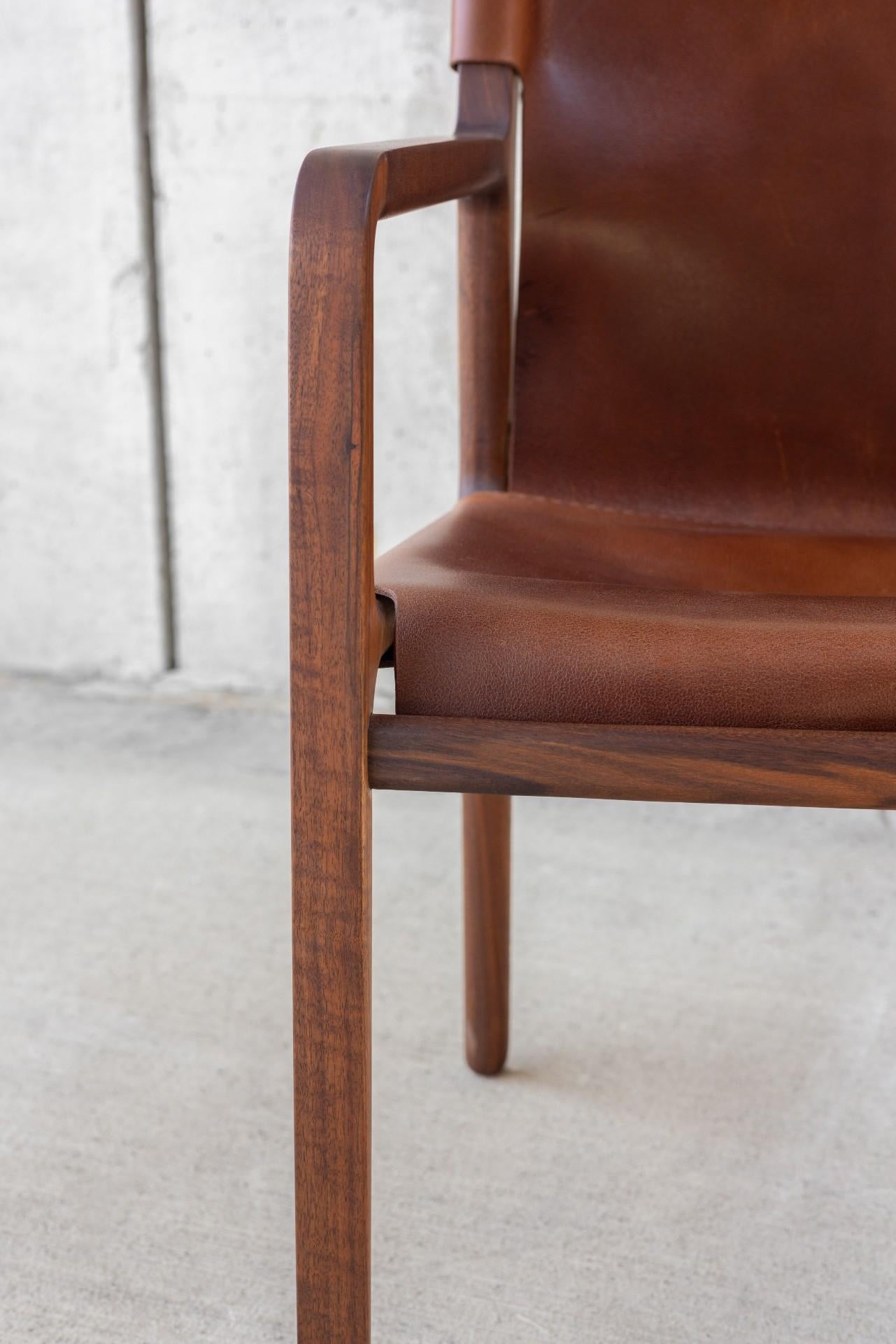 Modern Delano chair in black walnut and chestnut leather For Sale