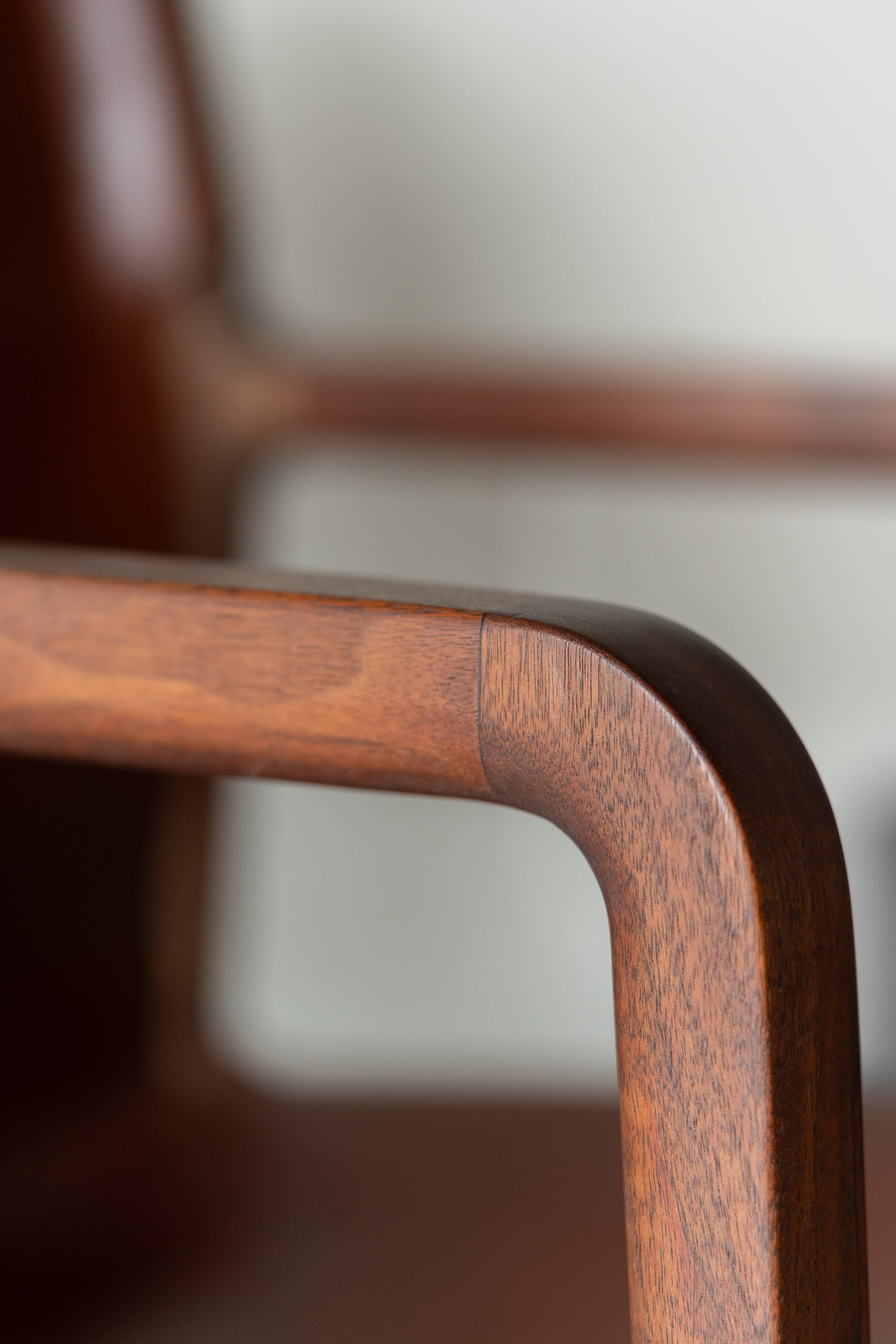 Contemporary Delano chair in black walnut and chestnut leather For Sale
