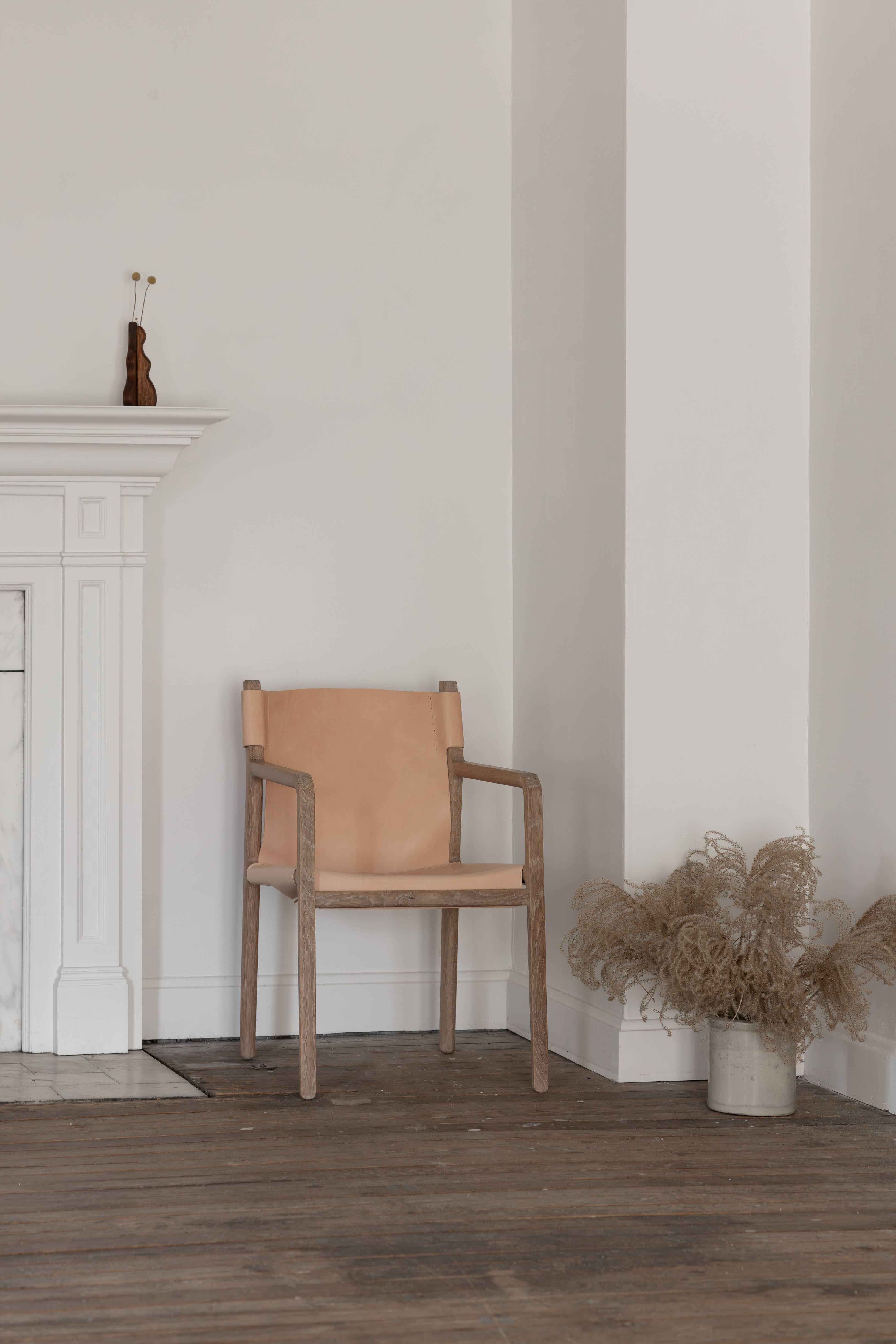 Brass Delano chair in black walnut and chestnut leather For Sale