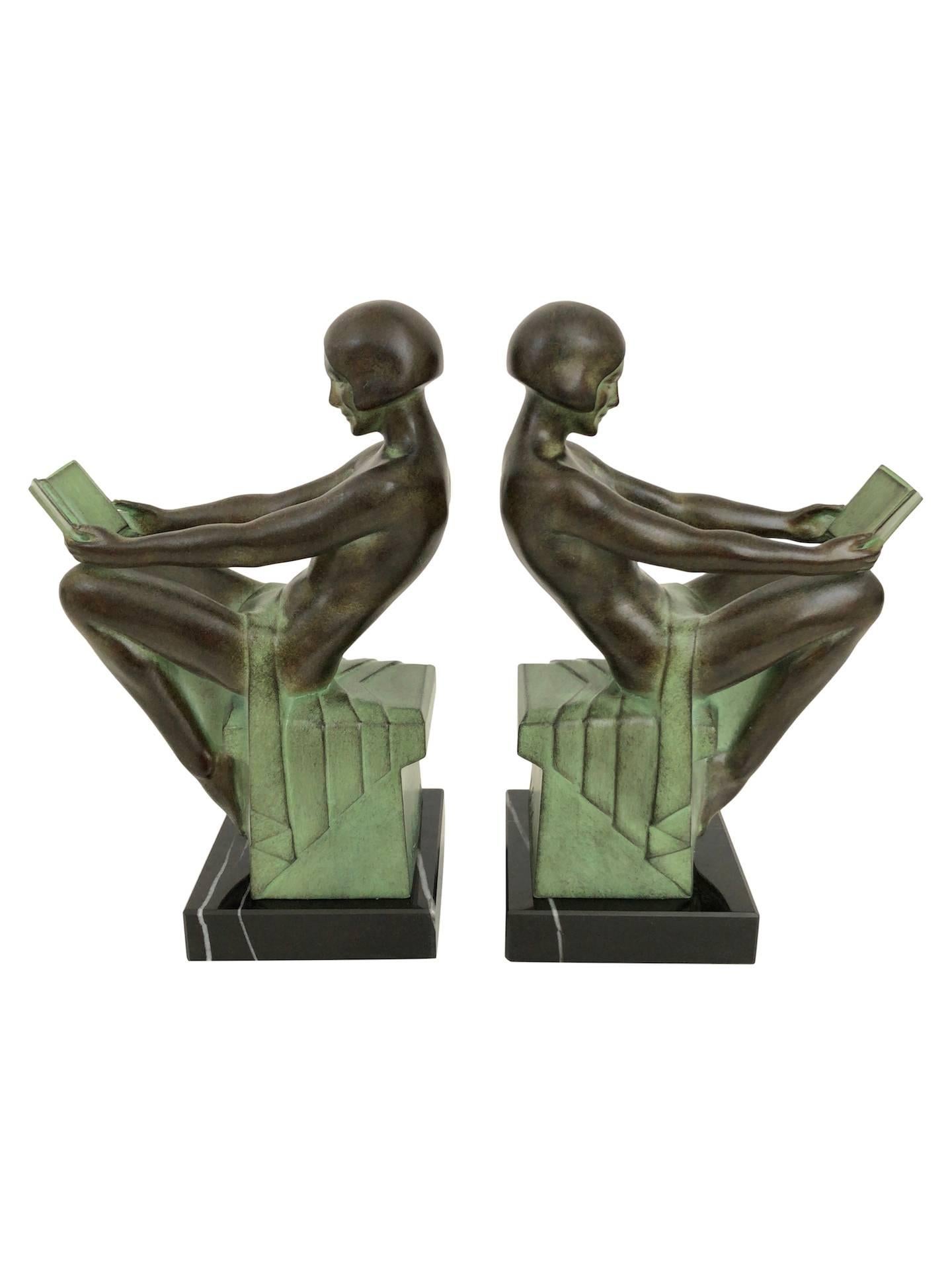 “Delassement”
Original “Max Le Verrier”
Designed in France during the roaring 1920s by “Max Le Verrier” (1891-1973)
Art Deco style, France.

Sculptures of reading ladies
Bookends made in spelter (French: “Régule”)
Socle in black marble (could