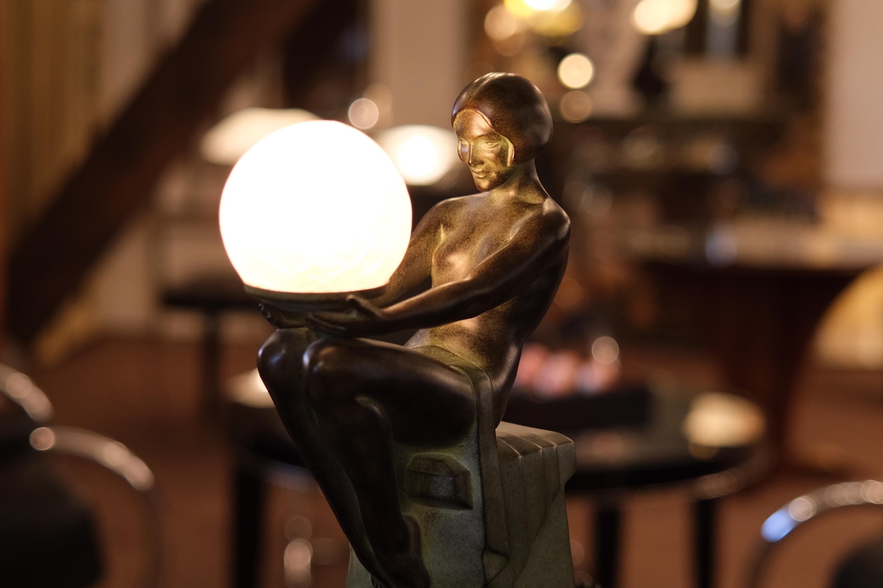 Patinated Delassement Lumineux French Art Deco Style Nude Sculpture Lamp by Max Le Verrier