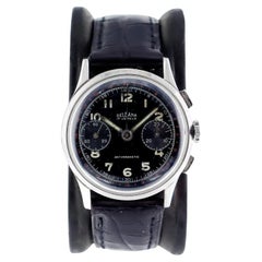 Montre en acier inoxydable avec cadran manuel chronographe noir, de Delbana, vers les années 1940
