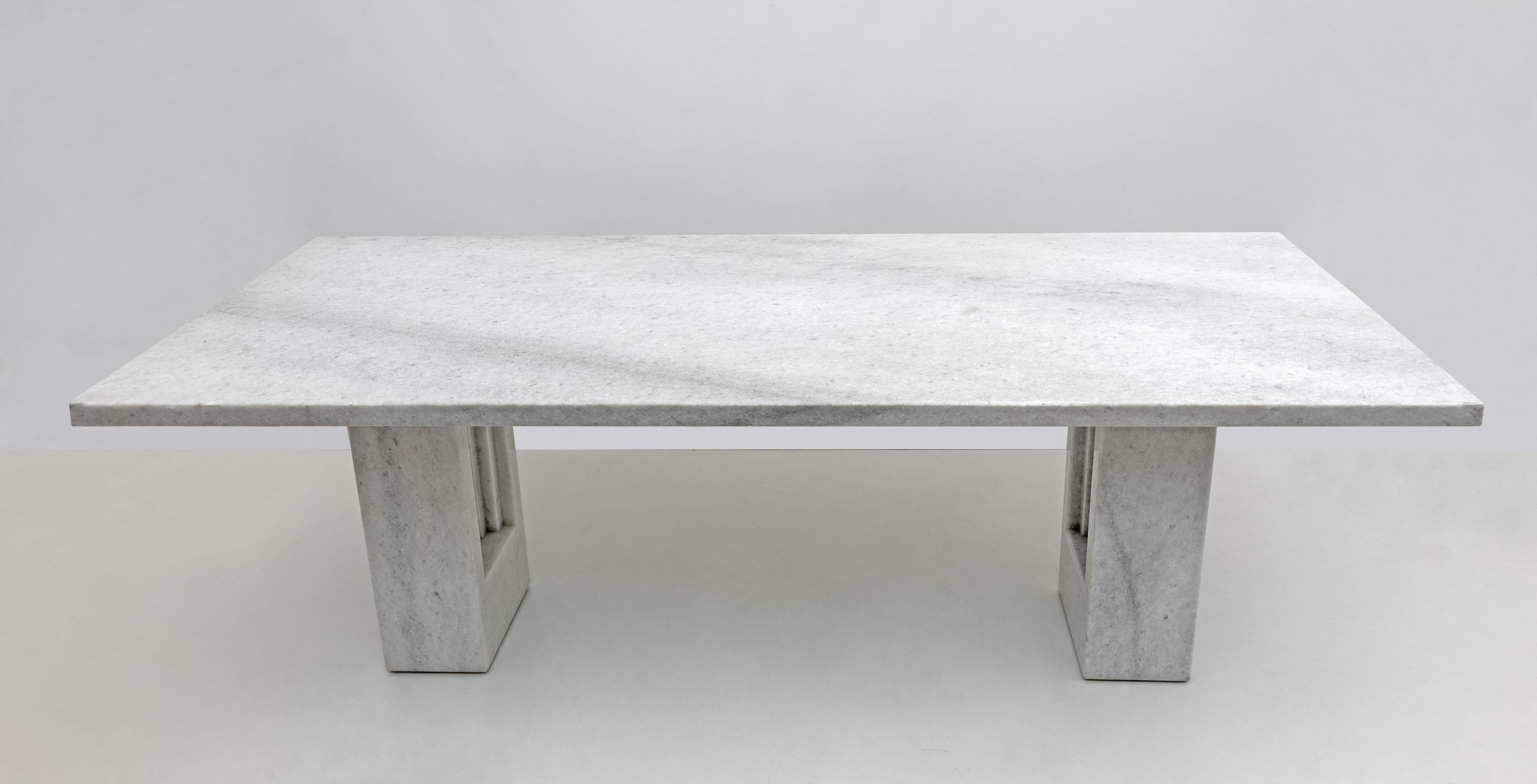 Original Delfi table in excellent condition.

Produced by Gavina, Italy

Designed by Carlo Scarpa and Marcel Breuer

This particular table is made of a rare Bianco Cristallino marble with silver flakes (See featured image)
As far as we know this is