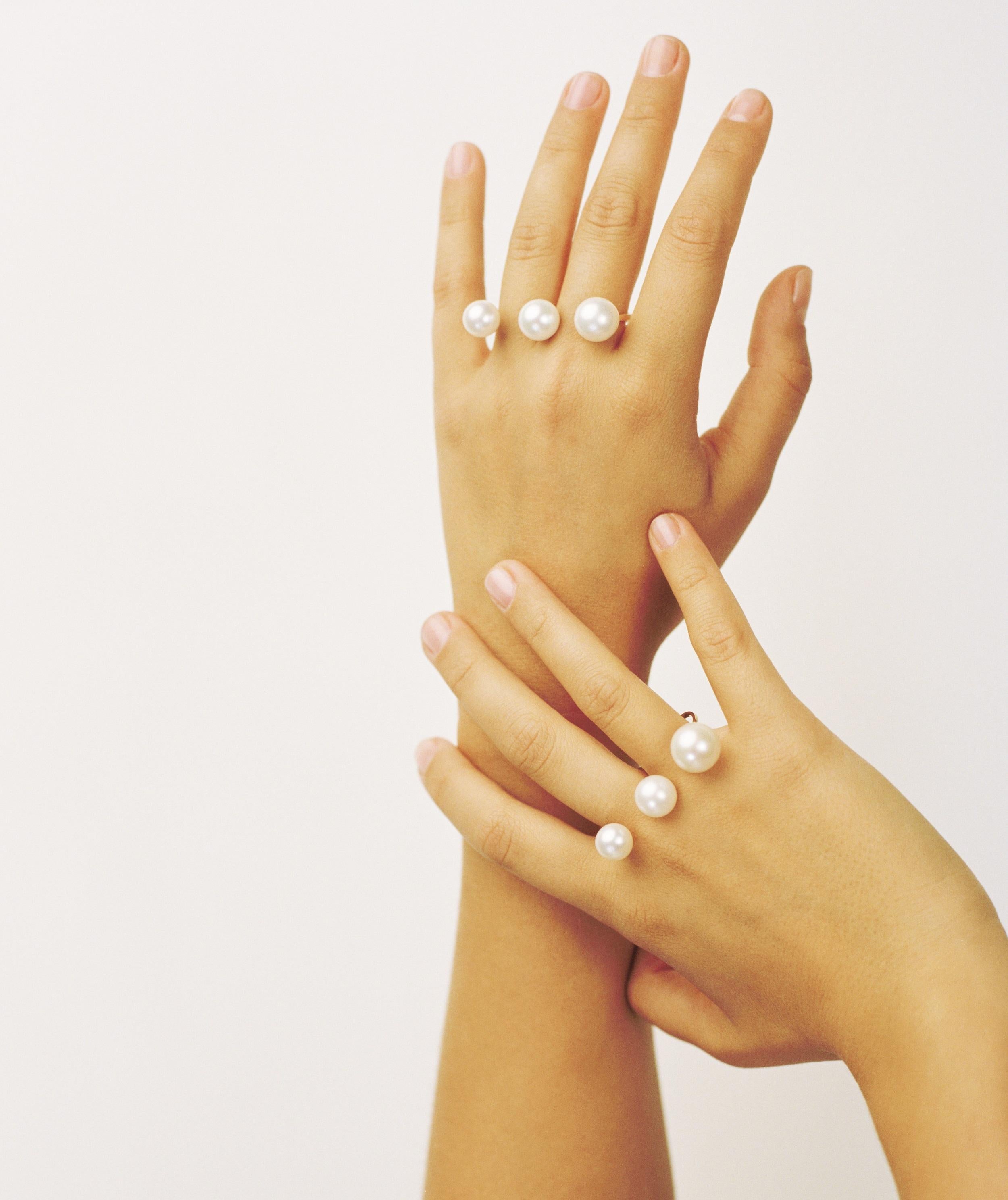 The Triple Pearl ring from italian jeweller Delfina Delettrez sits across two fingers and is studded with three white pearls, which appear to float on top of the fingers. It is handcrafted in Rome in 2,38 gr 18 karat yellow gold.

Lead time 4 weeks