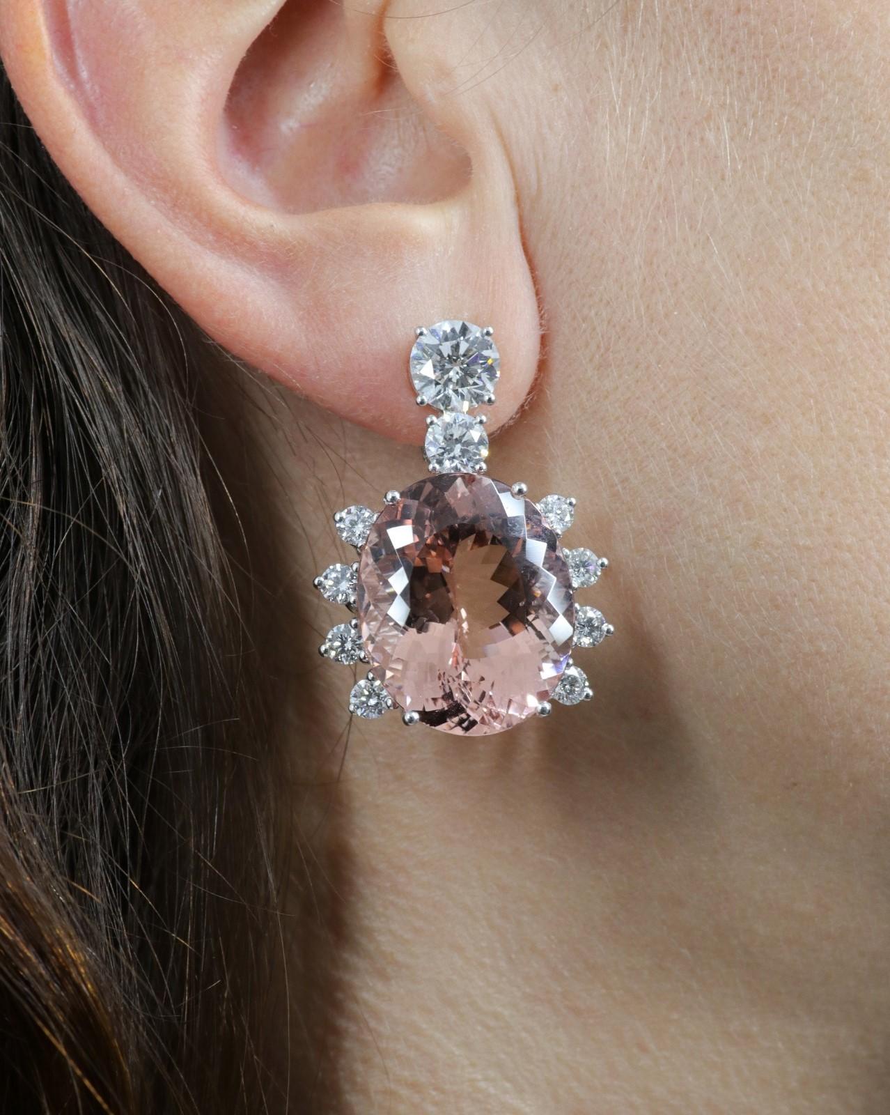 These one of a kind earrings designed by Italian jeweller Delfina Delettrez are handcrafted in her roman atelier from 18 karat white gold 25 gr, GIA certified 8,06 carat white diamonds and two morganite 60 ct.