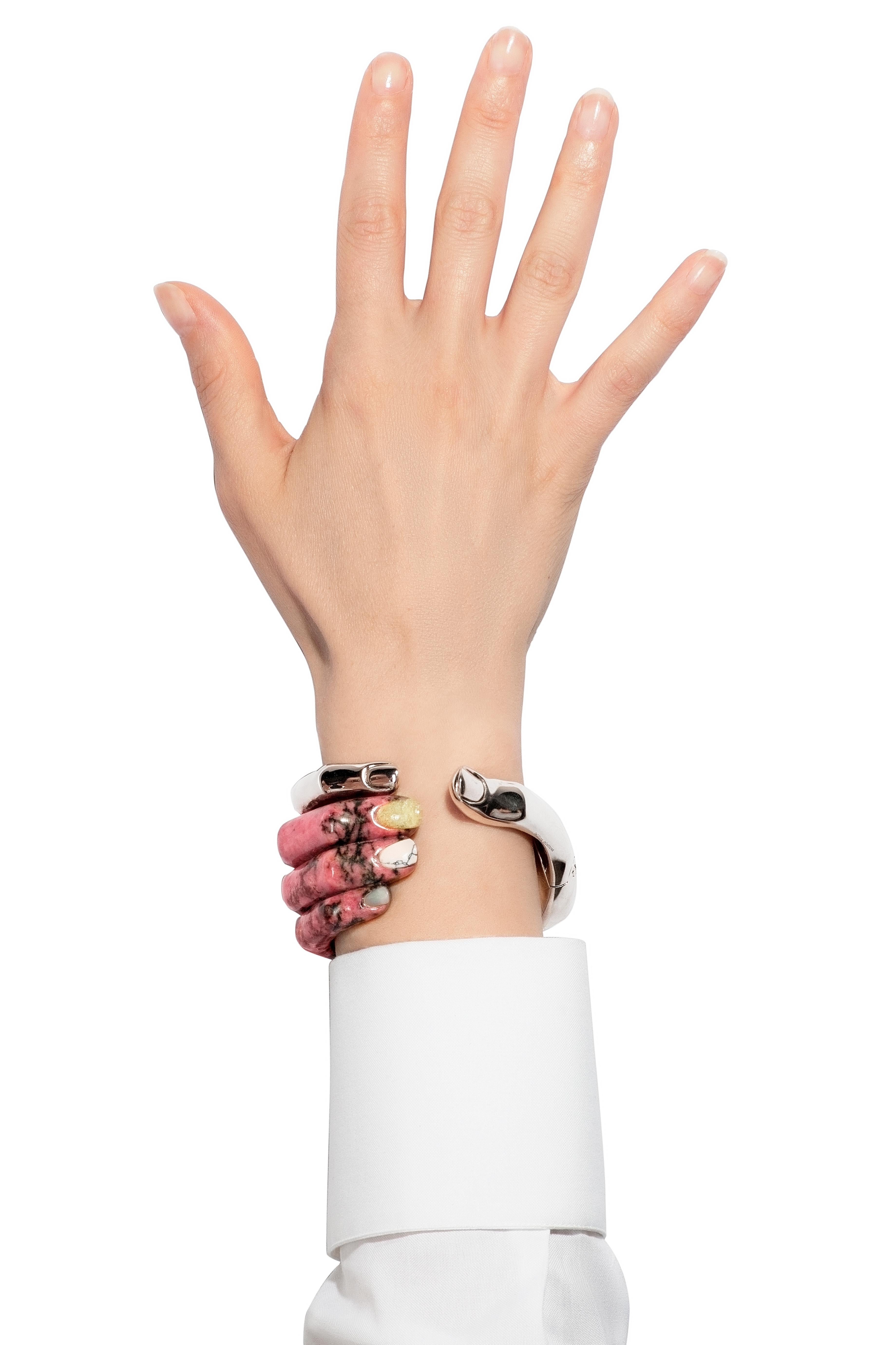 A unique, statement cuff bracelet created by Italian jeweller Delfina Delettrez. The Stonehand Bracelet is a playful study of the human anatomy and the designers fascination with adorning the body parts in a nod to the surrealist movement and